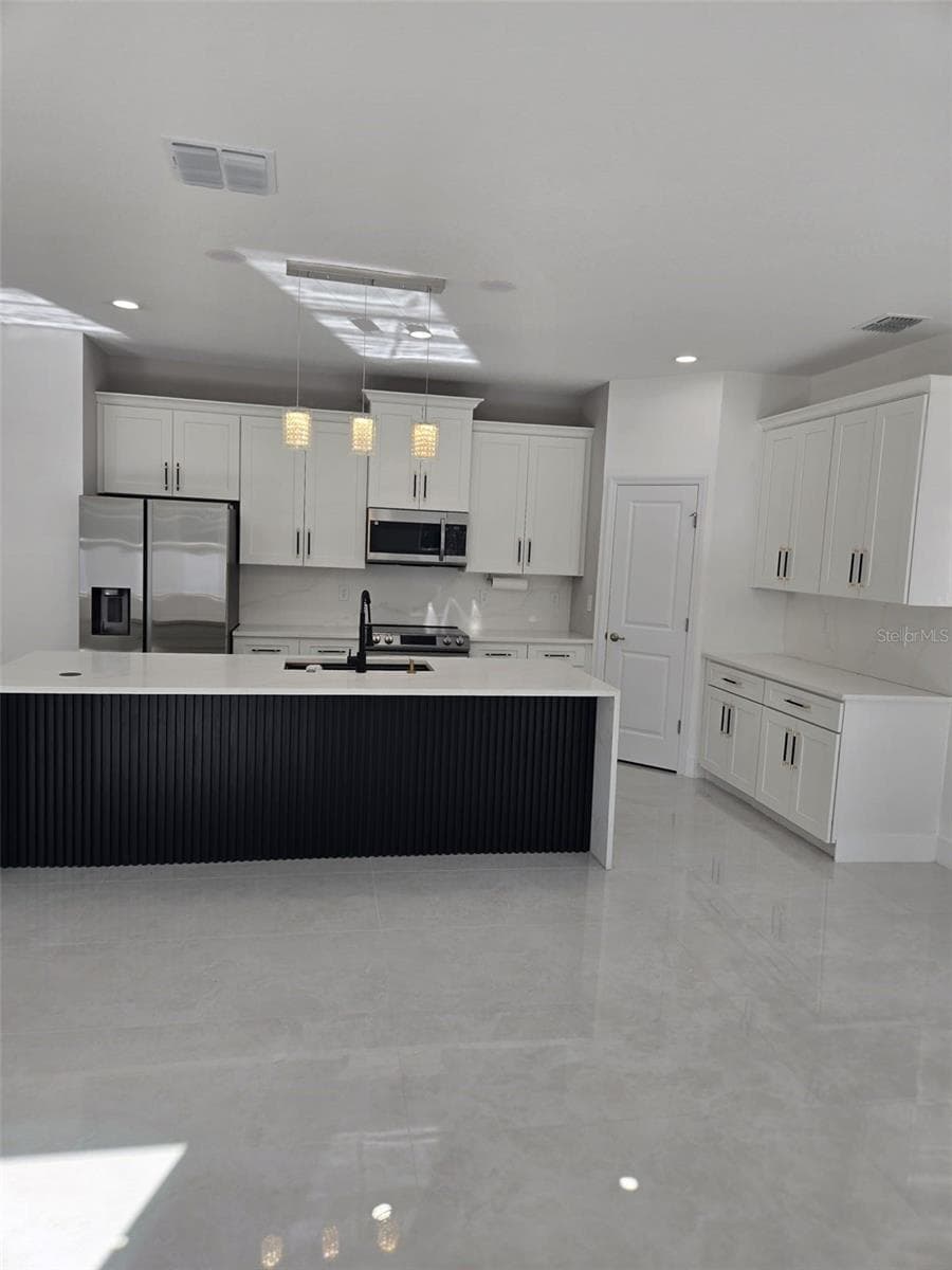 Single Family Residence at 13417 E DELAWARE AVE, ASTATULA, photo 12 of 24