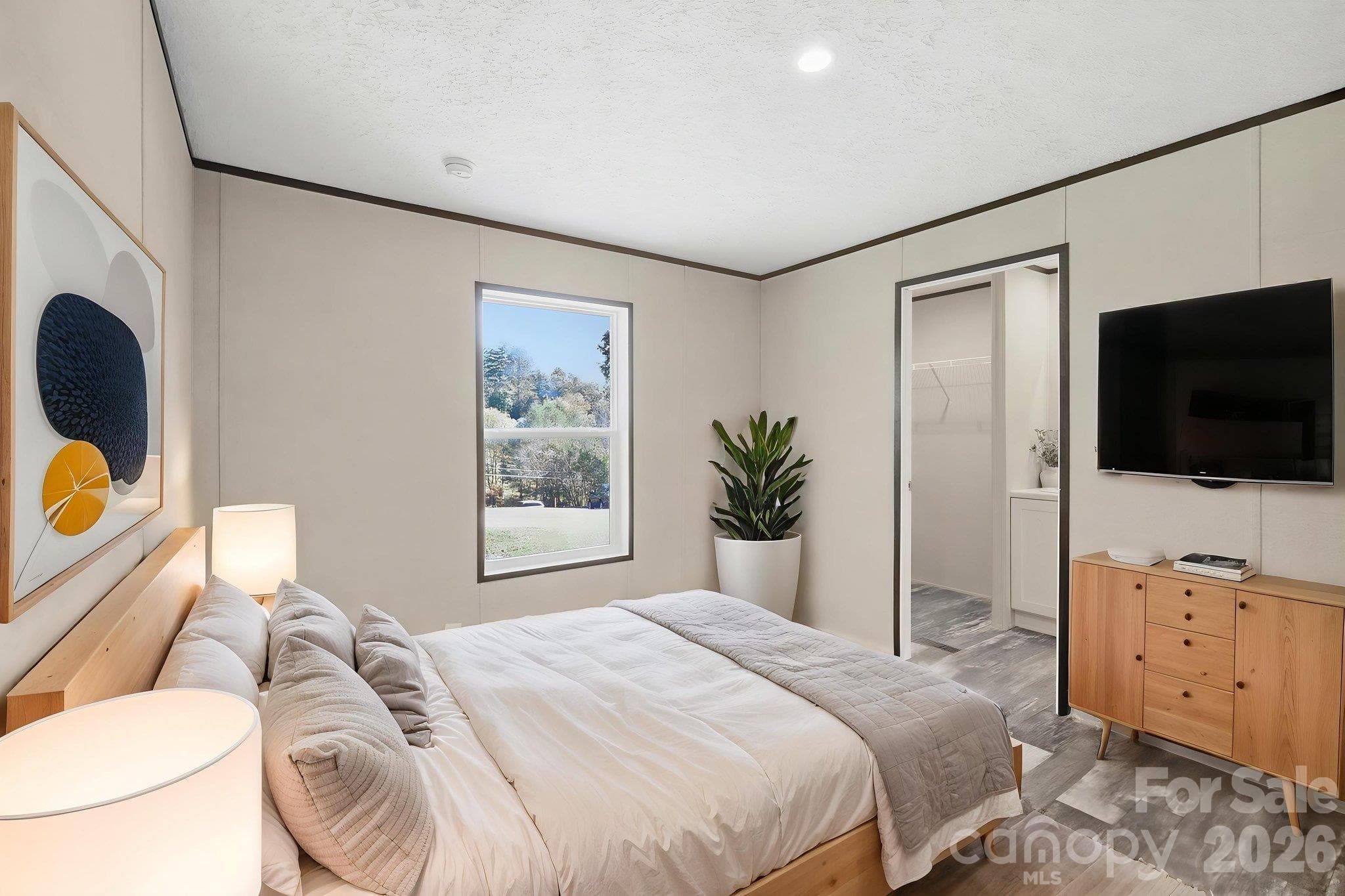 Virtual staged Primary bedroom with amazing light. - 85 Trent Road, Brevard