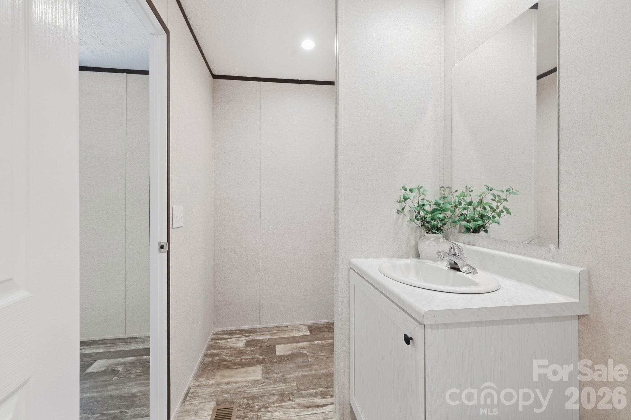 Primary bath offers a owners closet. - 85 Trent Road, Brevard