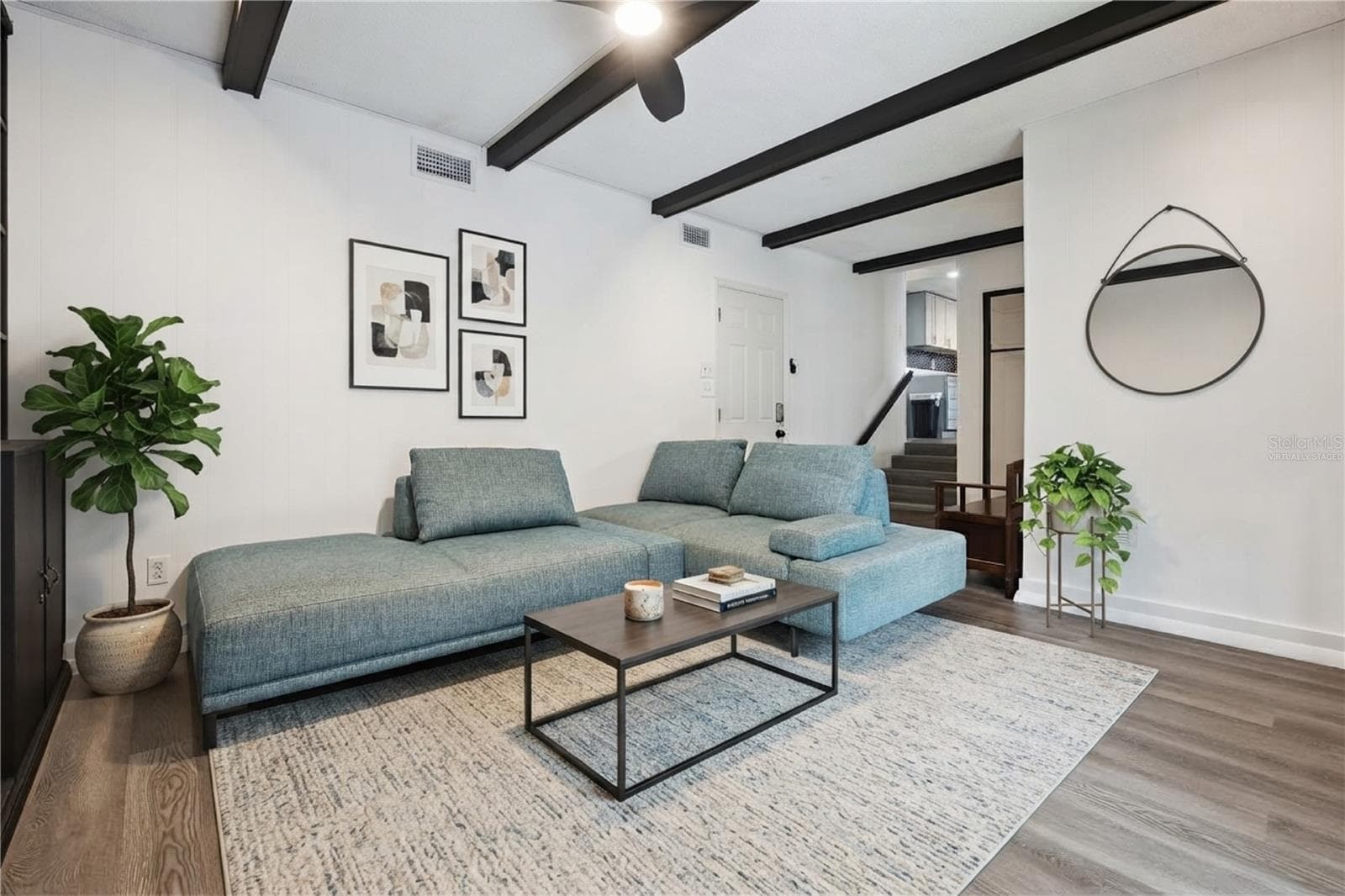 Family room virtually staged - 2228 KING CHARLES CT, WINTER PARK