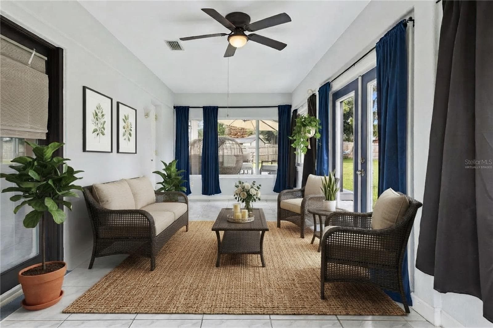 Florida room under AC virtually staged - 2228 KING CHARLES CT, WINTER PARK