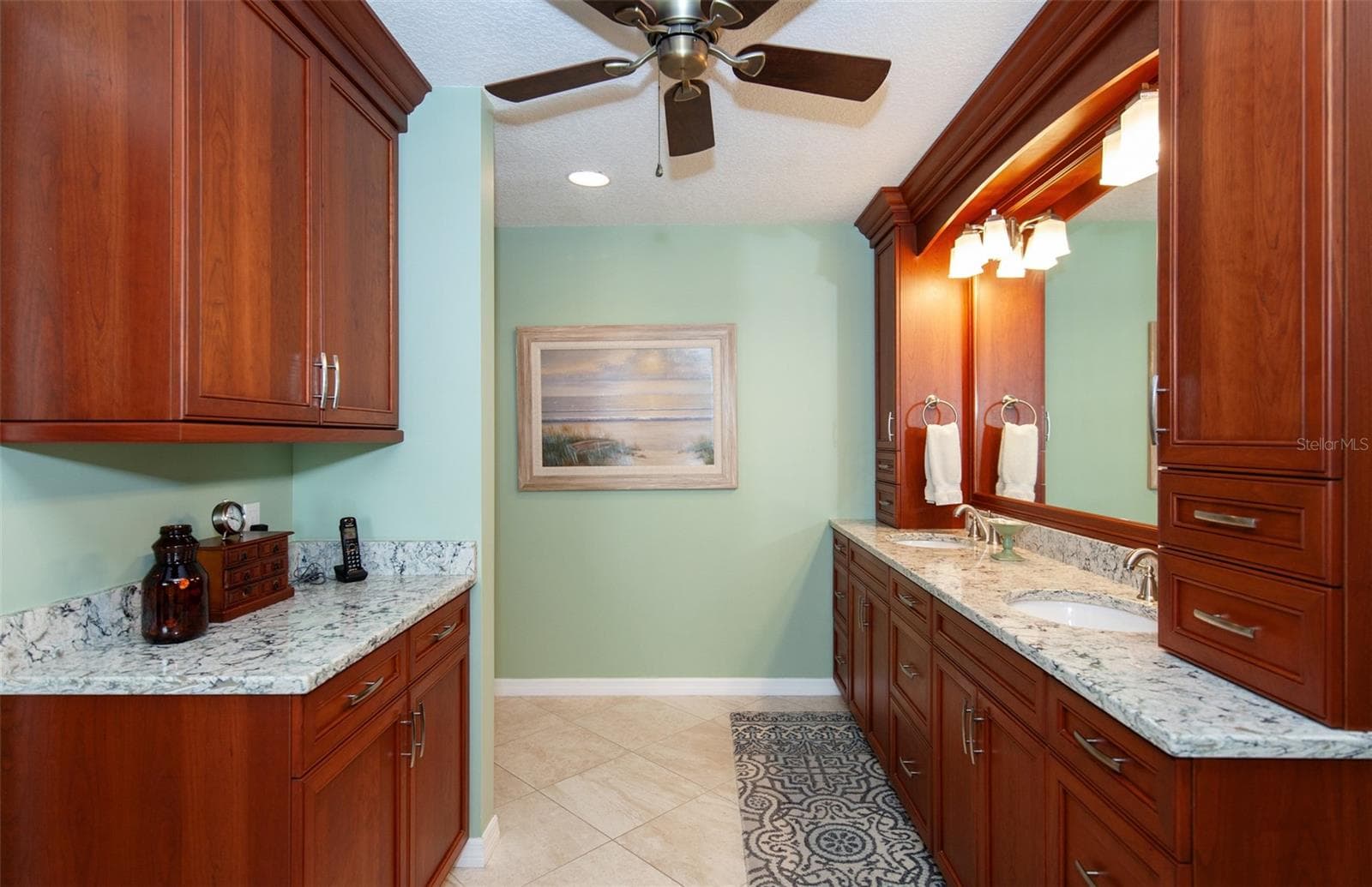 More cabinets in the primary bathroom - 810 CARNOUSTIE DR, VENICE