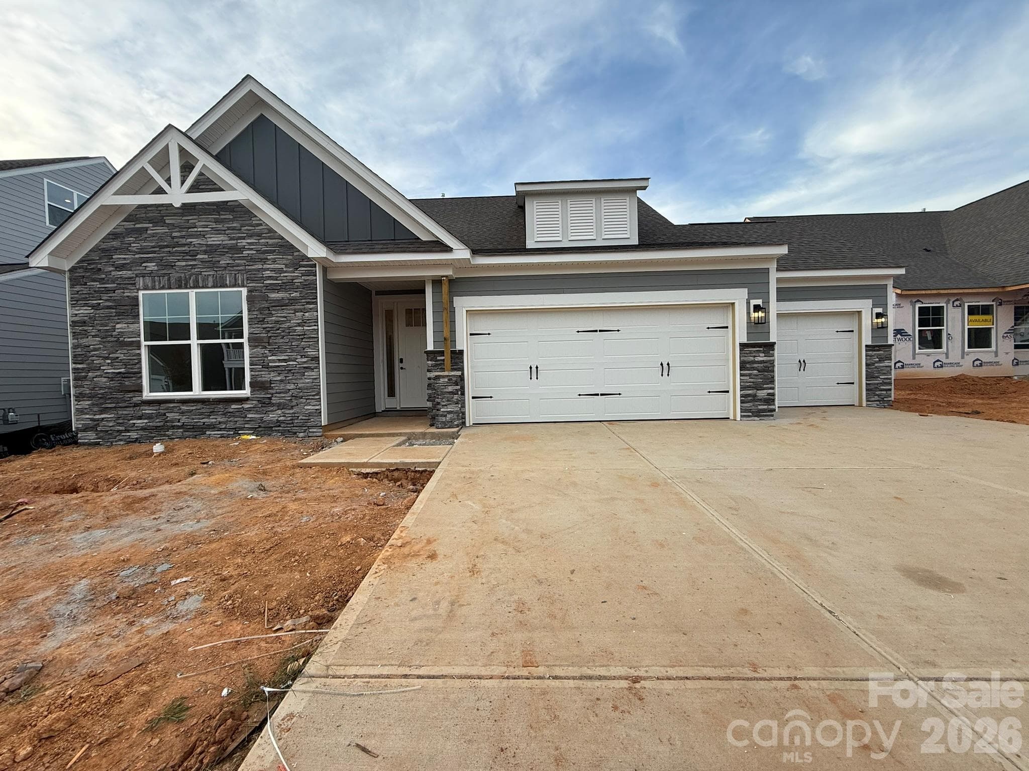 Homesite 102 features a Wescott B with utility garage - 4494 Blue Mound Court, Stanley