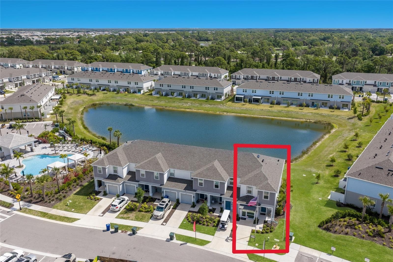 This unit is on a premium lot providing incredible views of the large community lake! - 15150 GINETTI ST, NOKOMIS