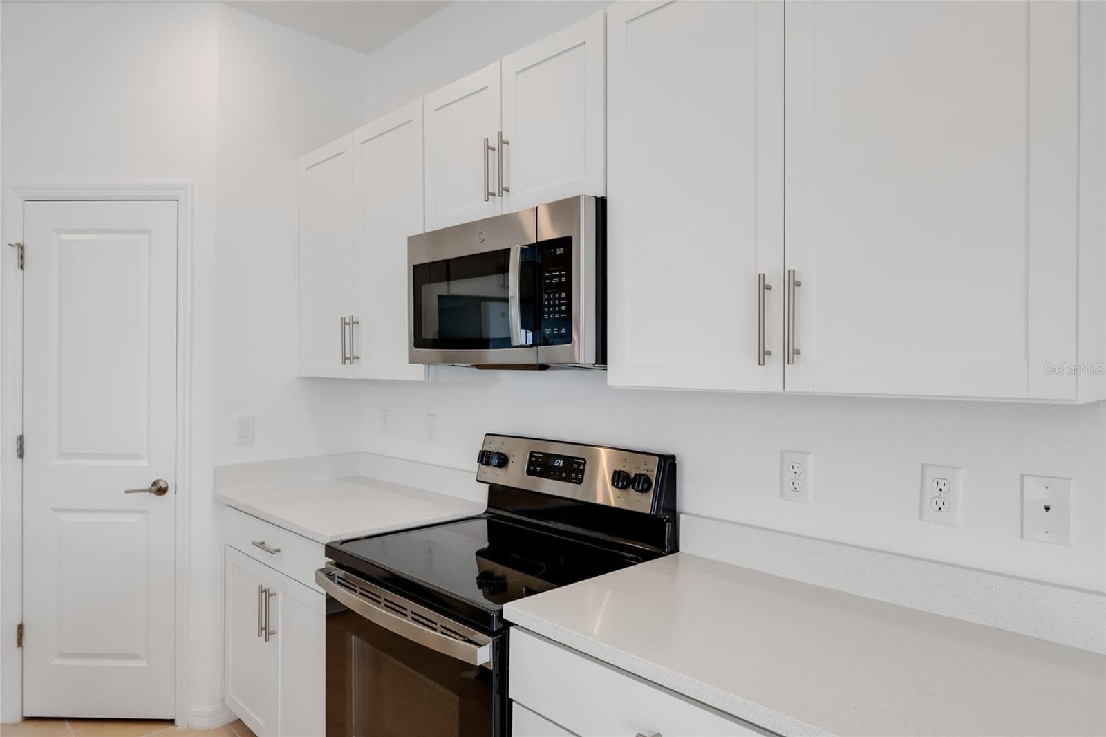 Stainless steel appliances throughout the kitchen finish the amazing kitchen look! - 15150 GINETTI ST, NOKOMIS