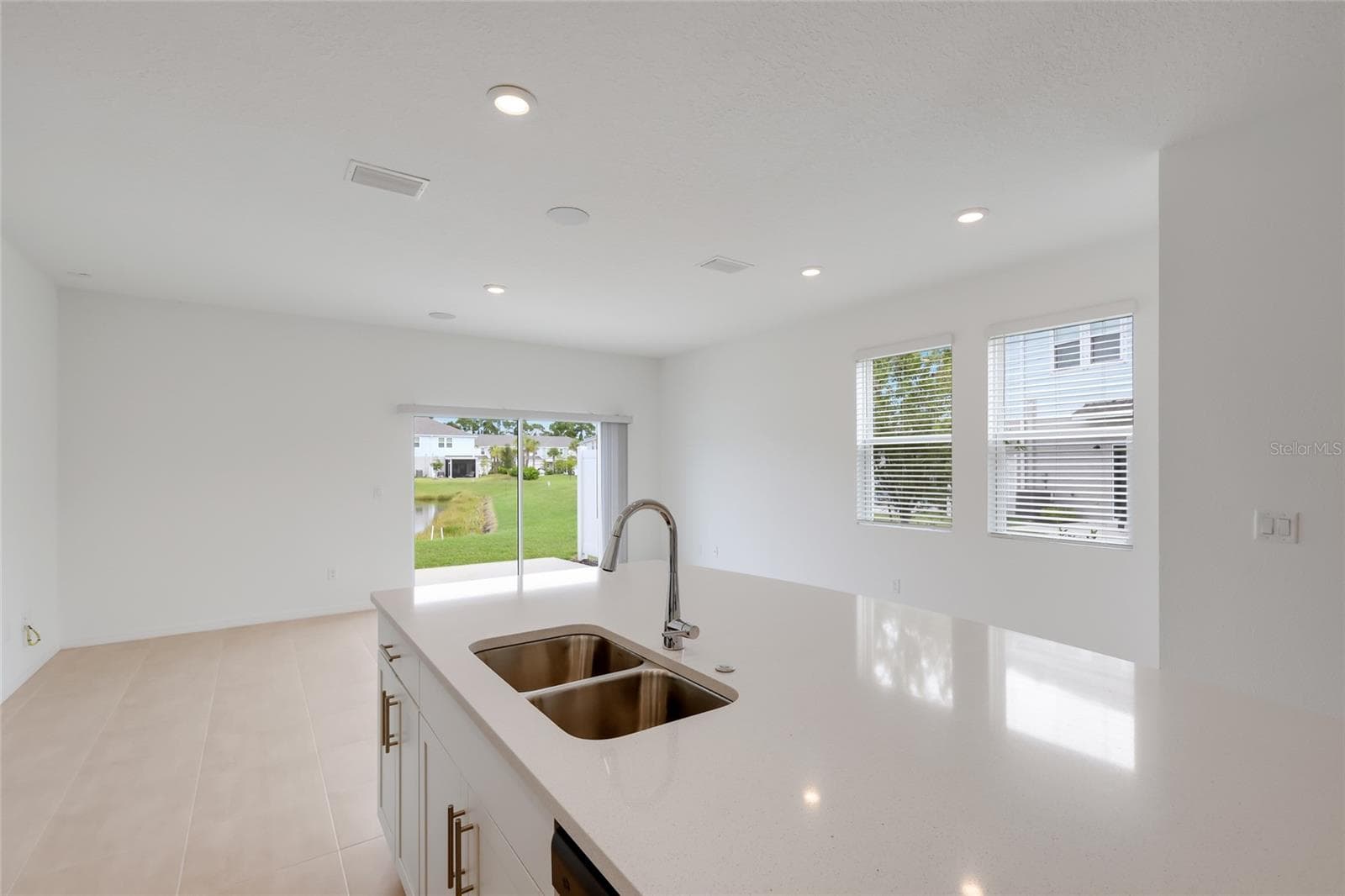 The family room has ample room for a large entertainment center or to hang a large flat screen television for the ultimate in family entertainment! - 15150 GINETTI ST, NOKOMIS
