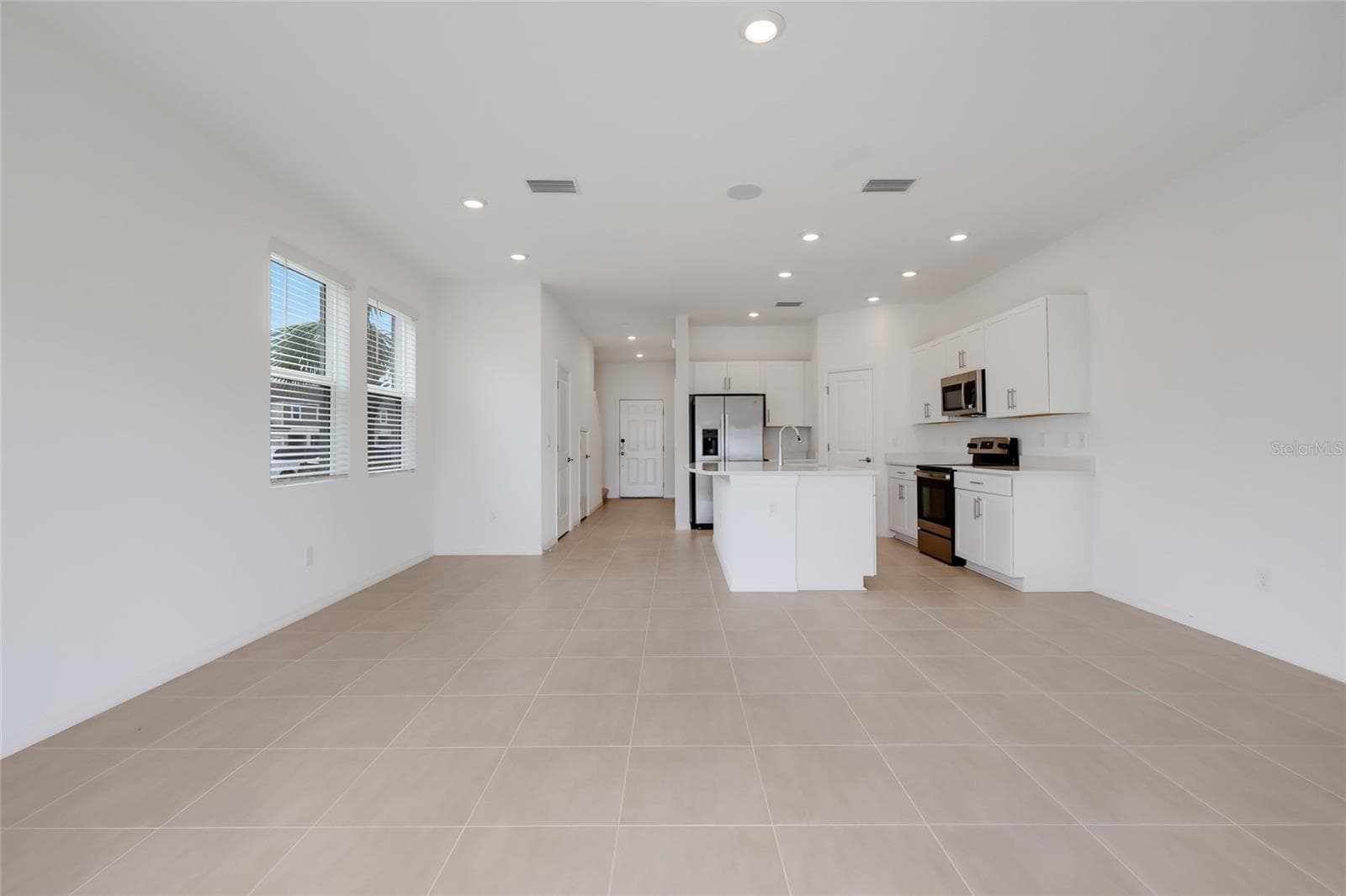 The first-floor layout provides amazing room and space for any type of living! - 15150 GINETTI ST, NOKOMIS