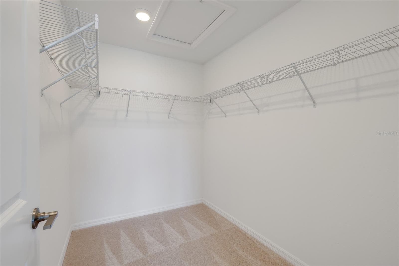 The walk-in closet for the master bedroom is large and roomy for any wardrobe size! There is plenty of room to add closet built-ins for even greater space/storage/hangings! - 15150 GINETTI ST, NOKOMIS