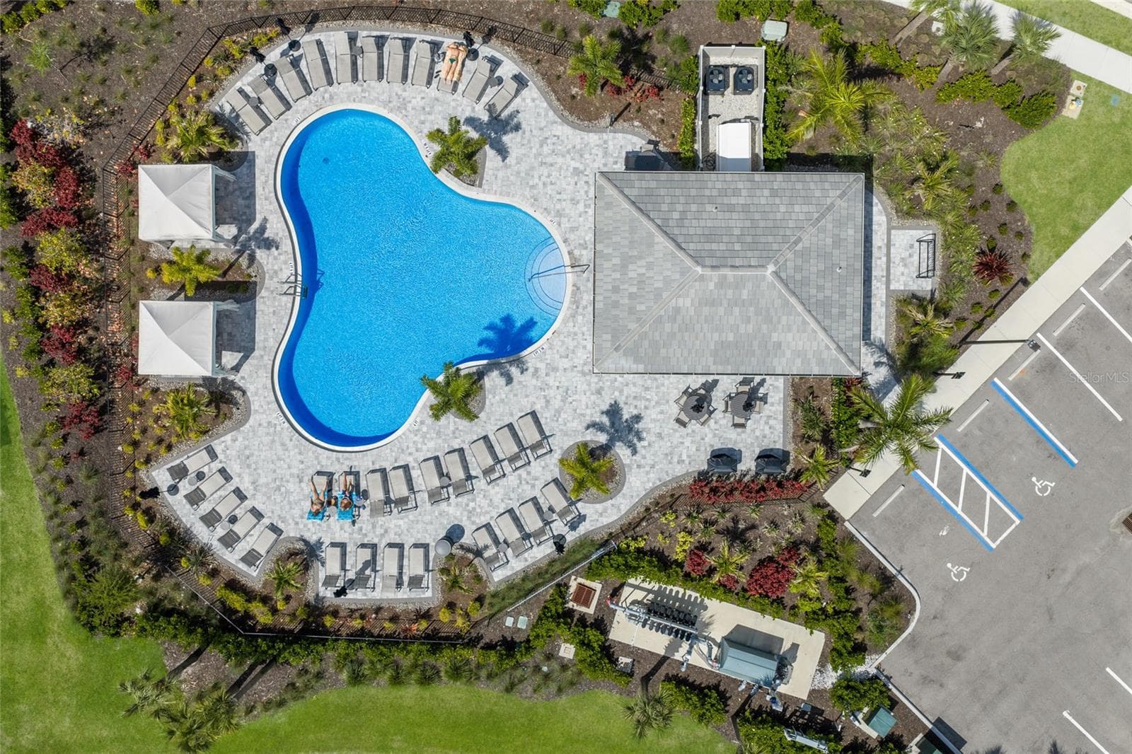 The crown jewel of the community is the resort style pool with cabanas and chaises - just a short walk from the front door! - 15150 GINETTI ST, NOKOMIS