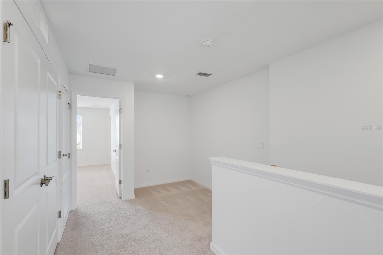 The loft area is perfect for a desk/office arrangement in the far corner! The laundry area is just off to the side providing easy use for all family members! - 15150 GINETTI ST, NOKOMIS