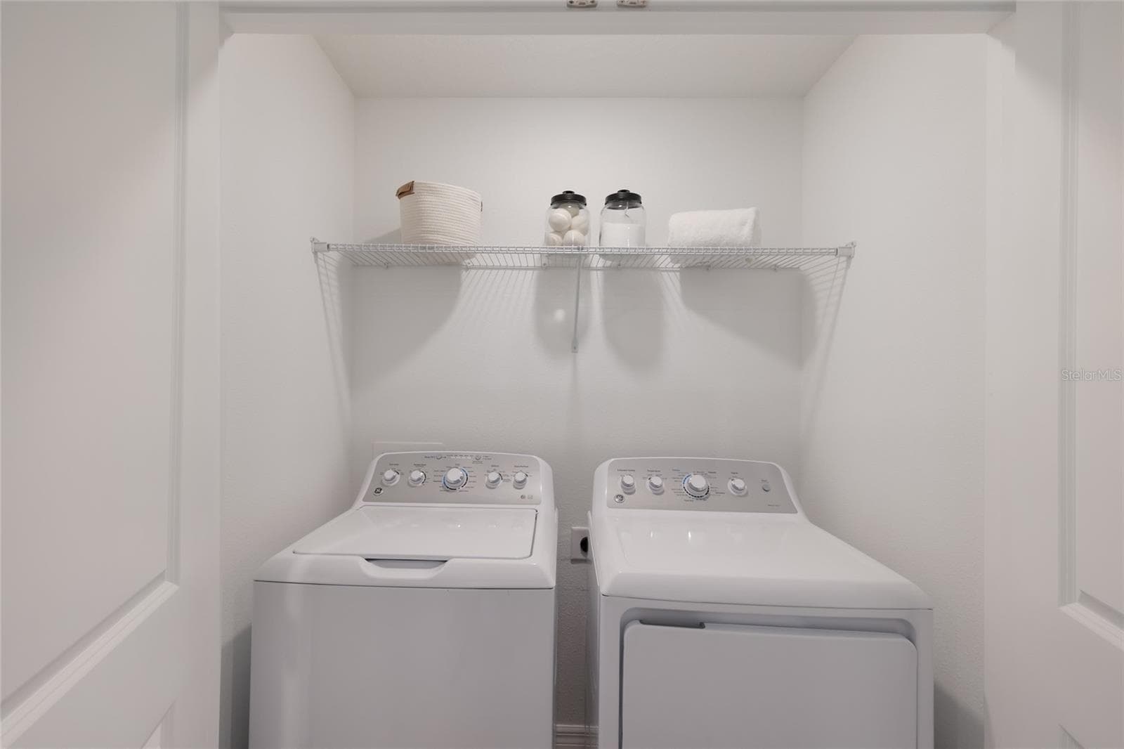 The laundry area/closet is located in the loft (on the second floor) for ease of use by all family members! - 15150 GINETTI ST, NOKOMIS