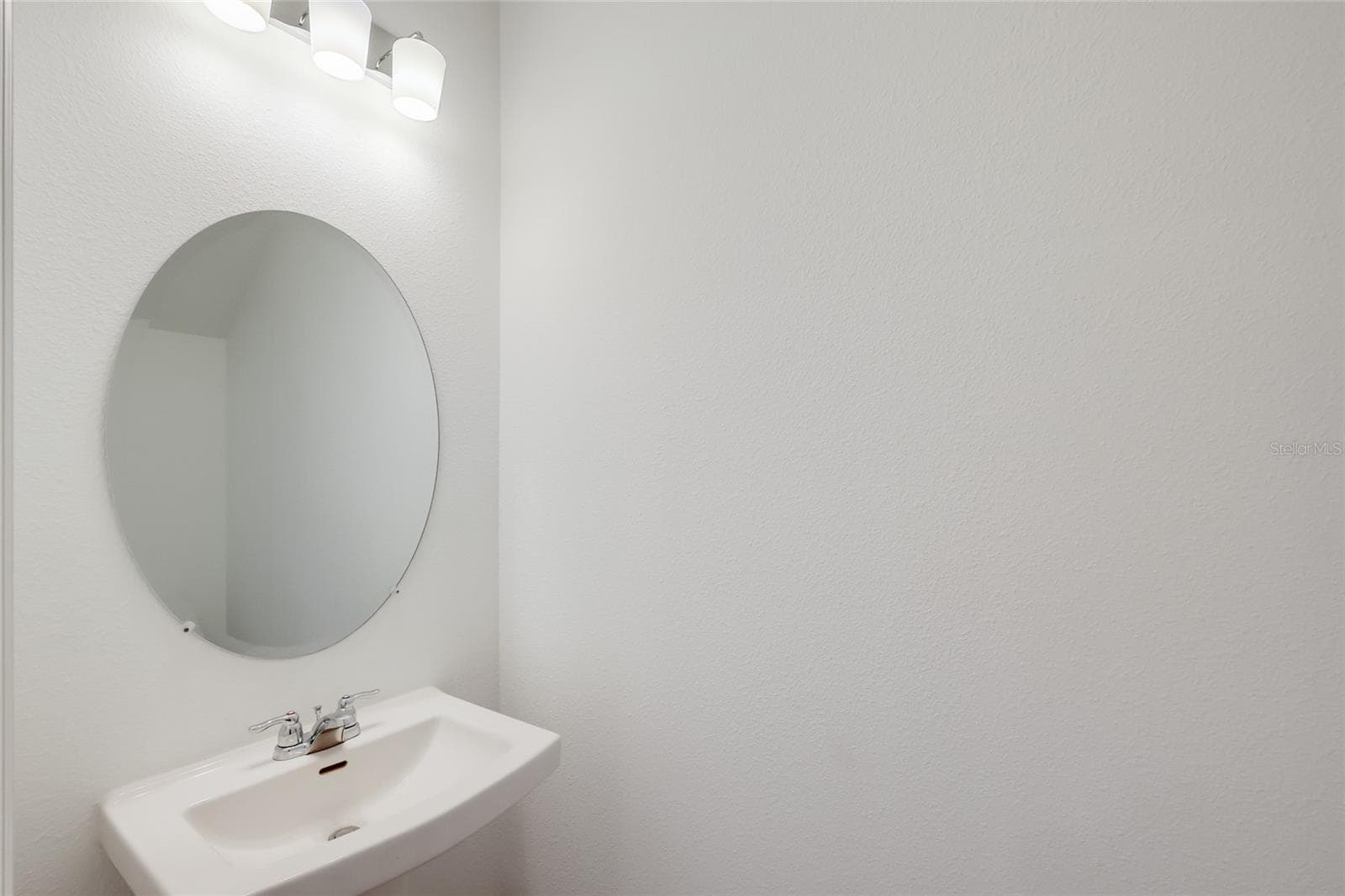 The powder room is situated off the great room and is ideally located for added convenience to all! - 15150 GINETTI ST, NOKOMIS
