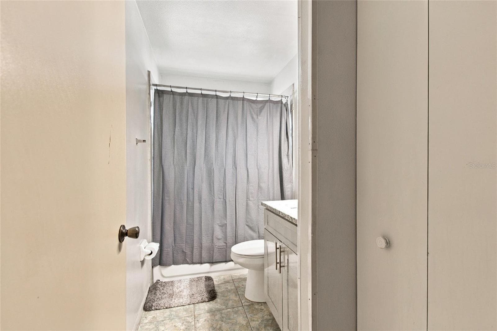 GUEST BATH -NEWER VANITY AND COUNTER. - 298 INDIAN POINT CIR, KISSIMMEE