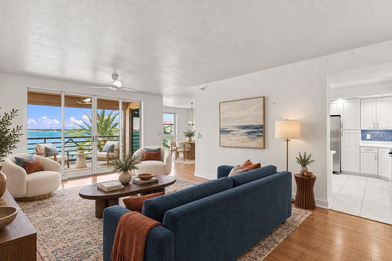 Living room virtually staged - 4993 BACOPA LN S #304, ST PETERSBURG