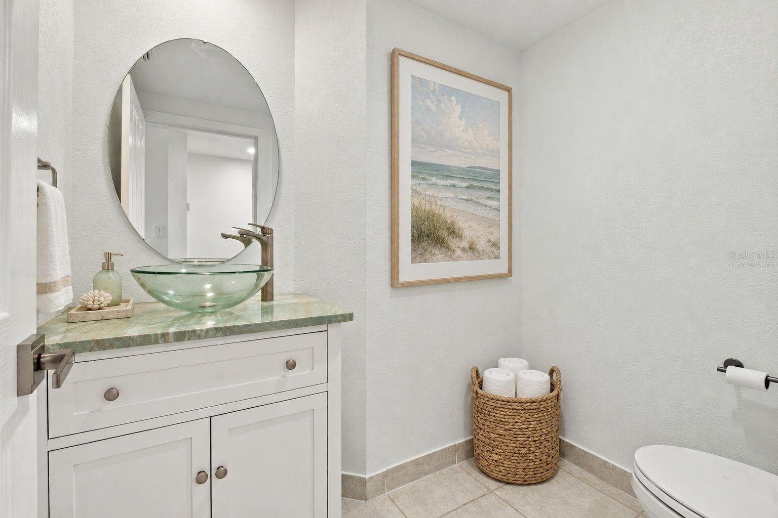 Half bath virtually staged - 4993 BACOPA LN S #304, ST PETERSBURG