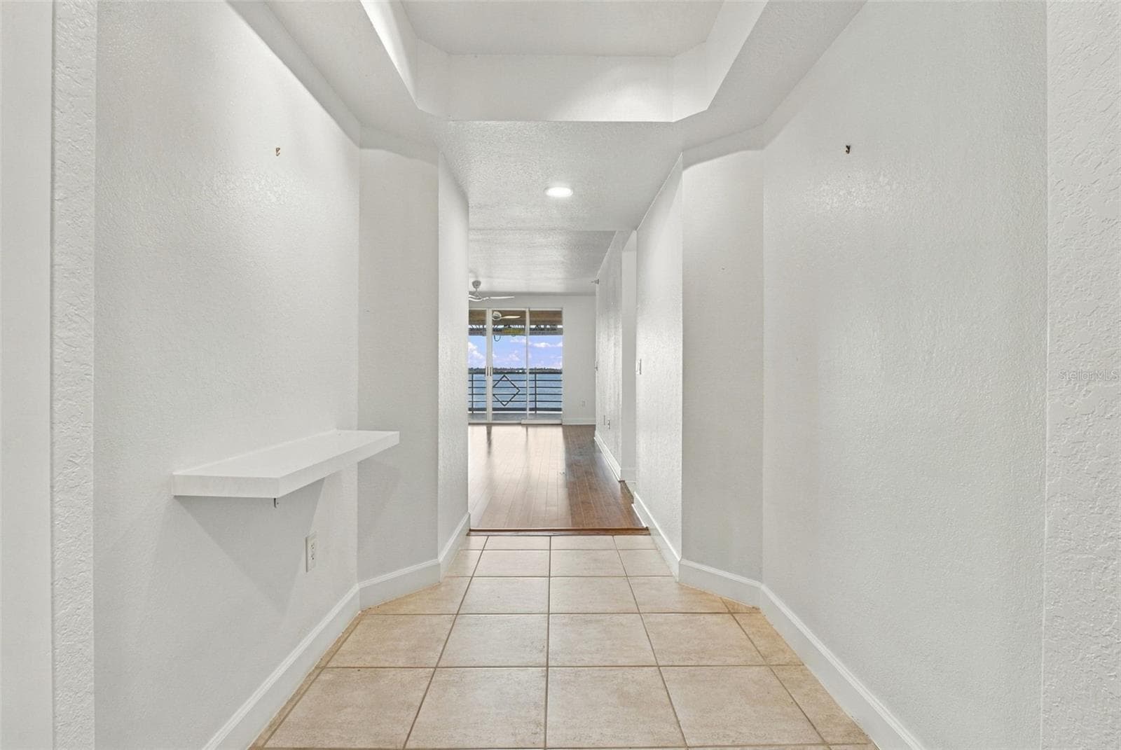 Front hallway entry - 4993 BACOPA LN S #304, ST PETERSBURG
