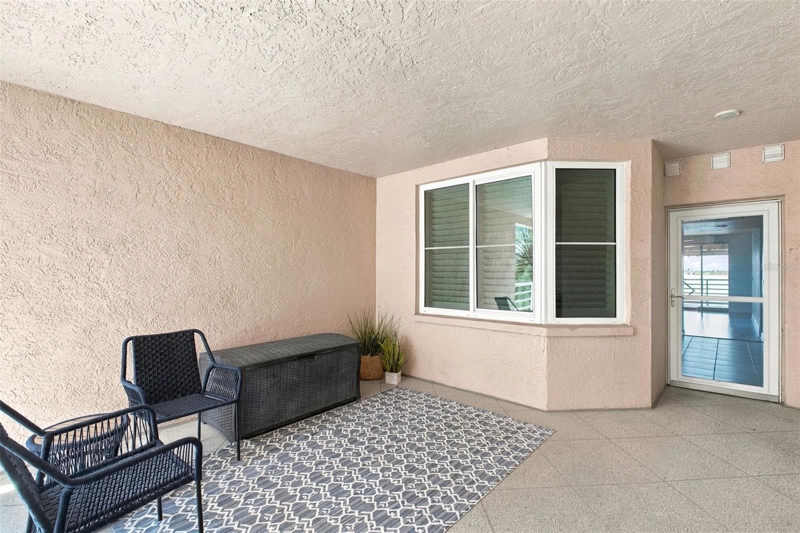 Front view landing with elevator & view - 4993 BACOPA LN S #304, ST PETERSBURG