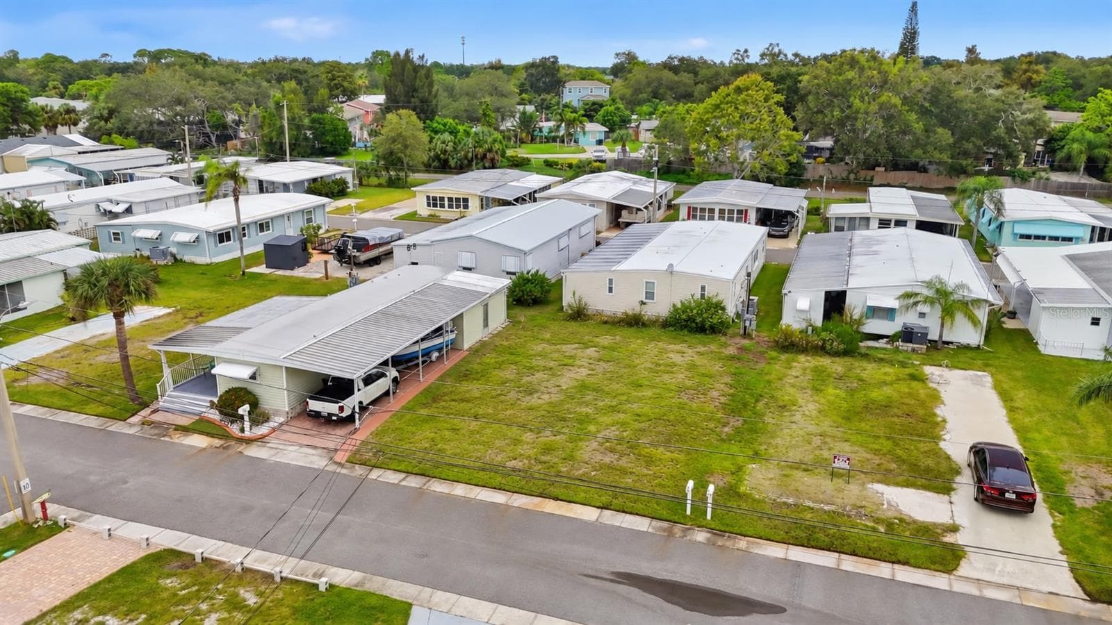 Arial view with mobile home removed to show vacant lot - 65 SCHOONER DR #65, PALM HARBOR
