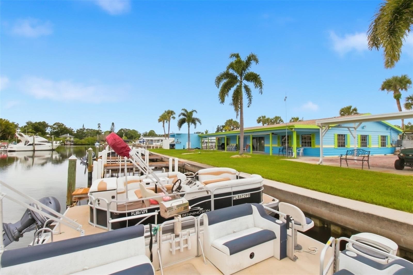 Back of clubhouse from canal - 65 SCHOONER DR #65, PALM HARBOR