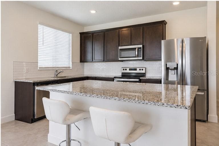 Single Family Residence at 3343 PINK OLEANDER AVE, MASCOTTE, photo 9 of 31