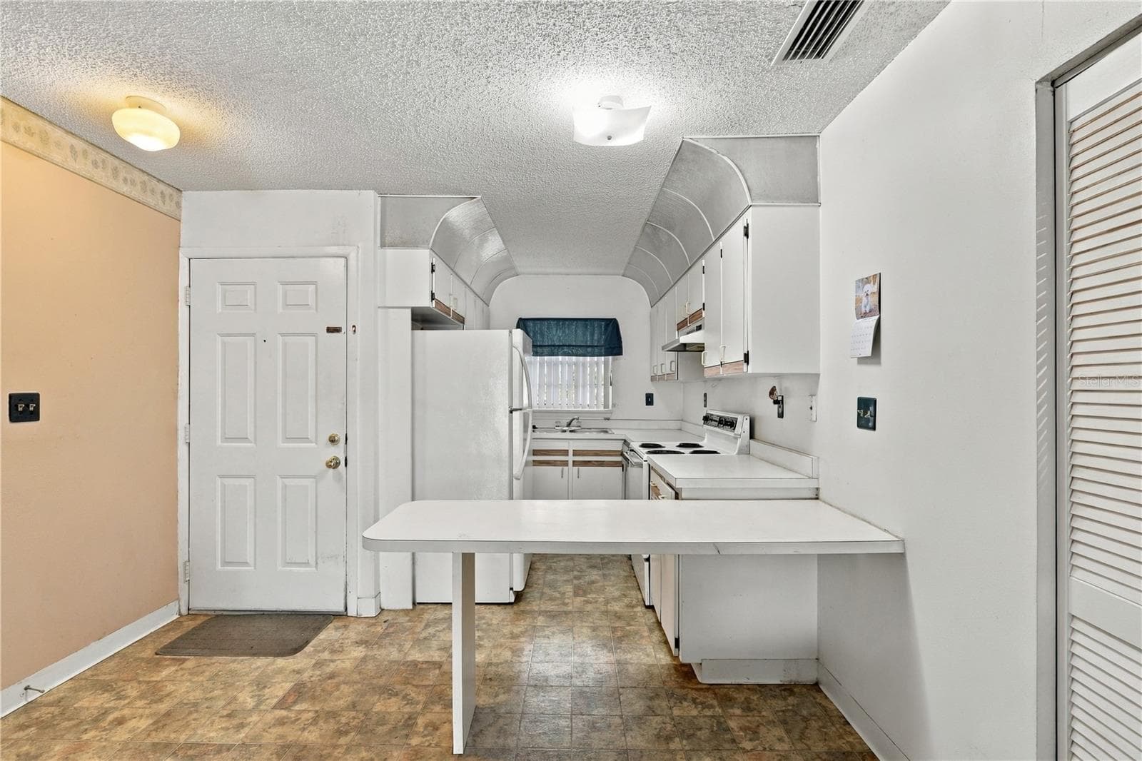 Condominium at 313 DIRKSEN DR #F13, DEBARY, photo 13 of 24