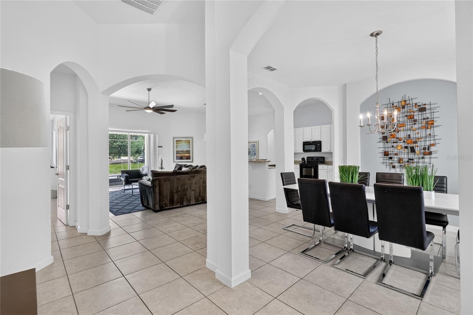 Dining room to the right with family room straight ahead - 277 YELLOW SNAPDRAGON DR, DAVENPORT