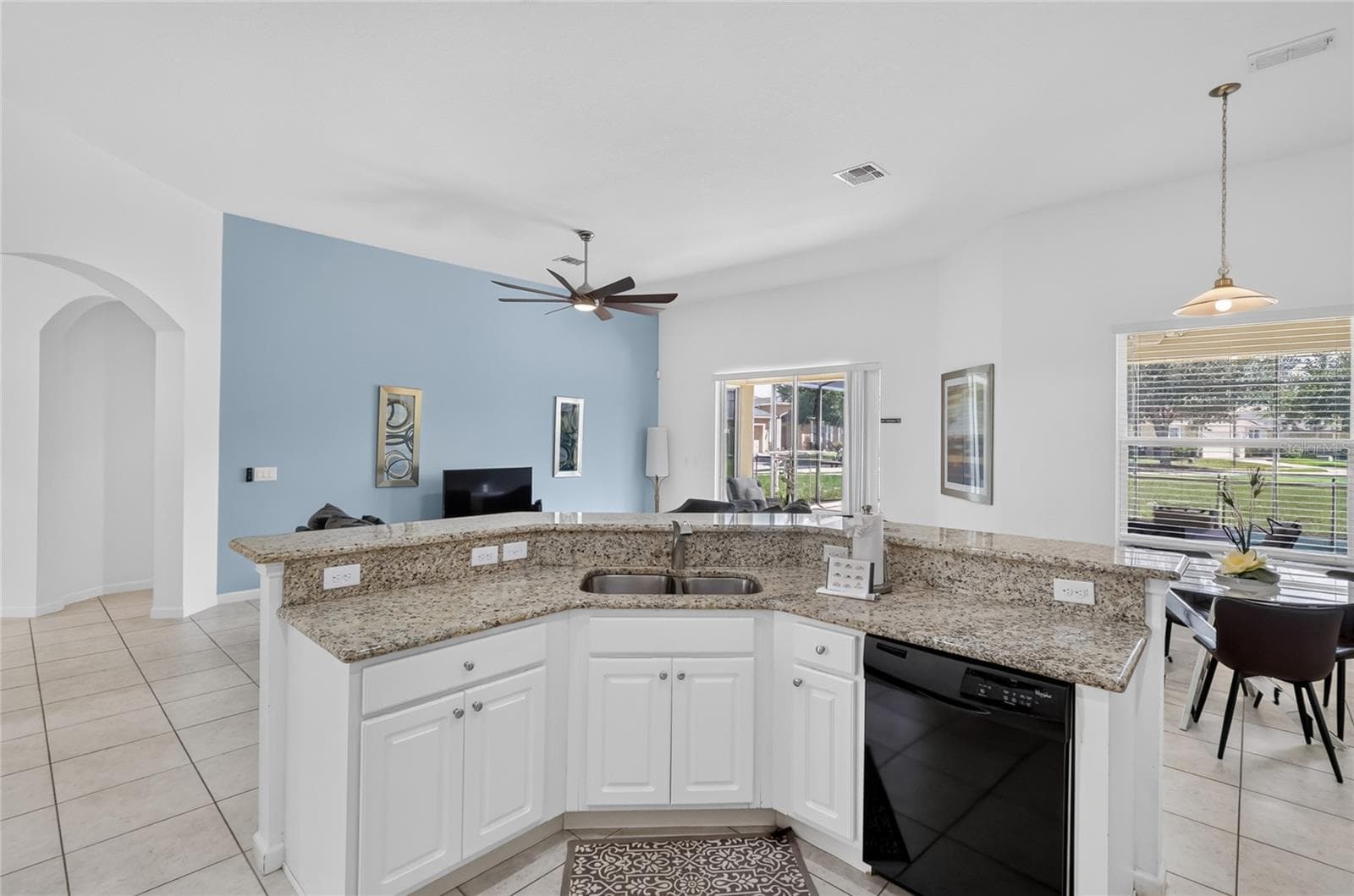 Looking towards the breakfast nook on the right and family room straight ahead - 277 YELLOW SNAPDRAGON DR, DAVENPORT