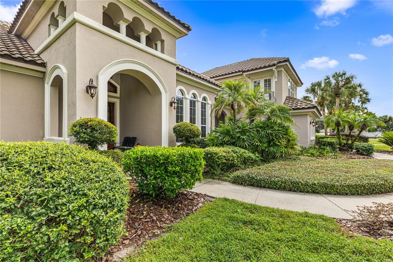 ENTRANCE VIEW W FRONT LANDSCAPING AND WALKWAY - 755 MILLS ESTATE PL, CHULUOTA