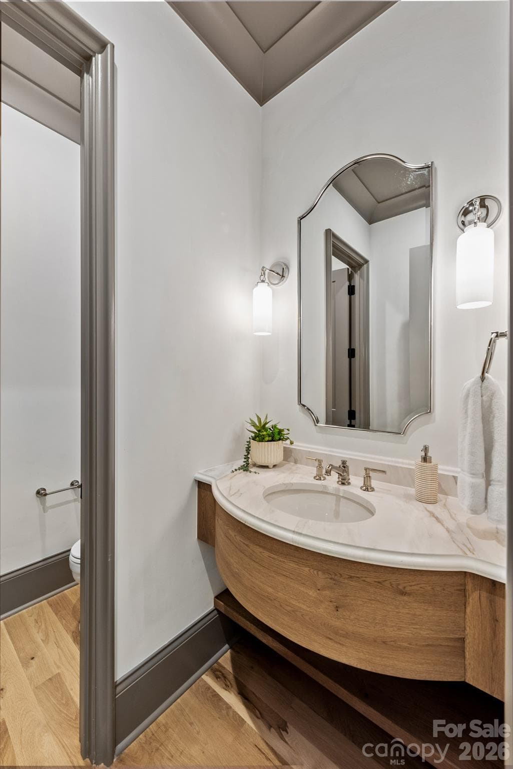 Main level powder room. - 133 Wonderwood Drive, Charlotte