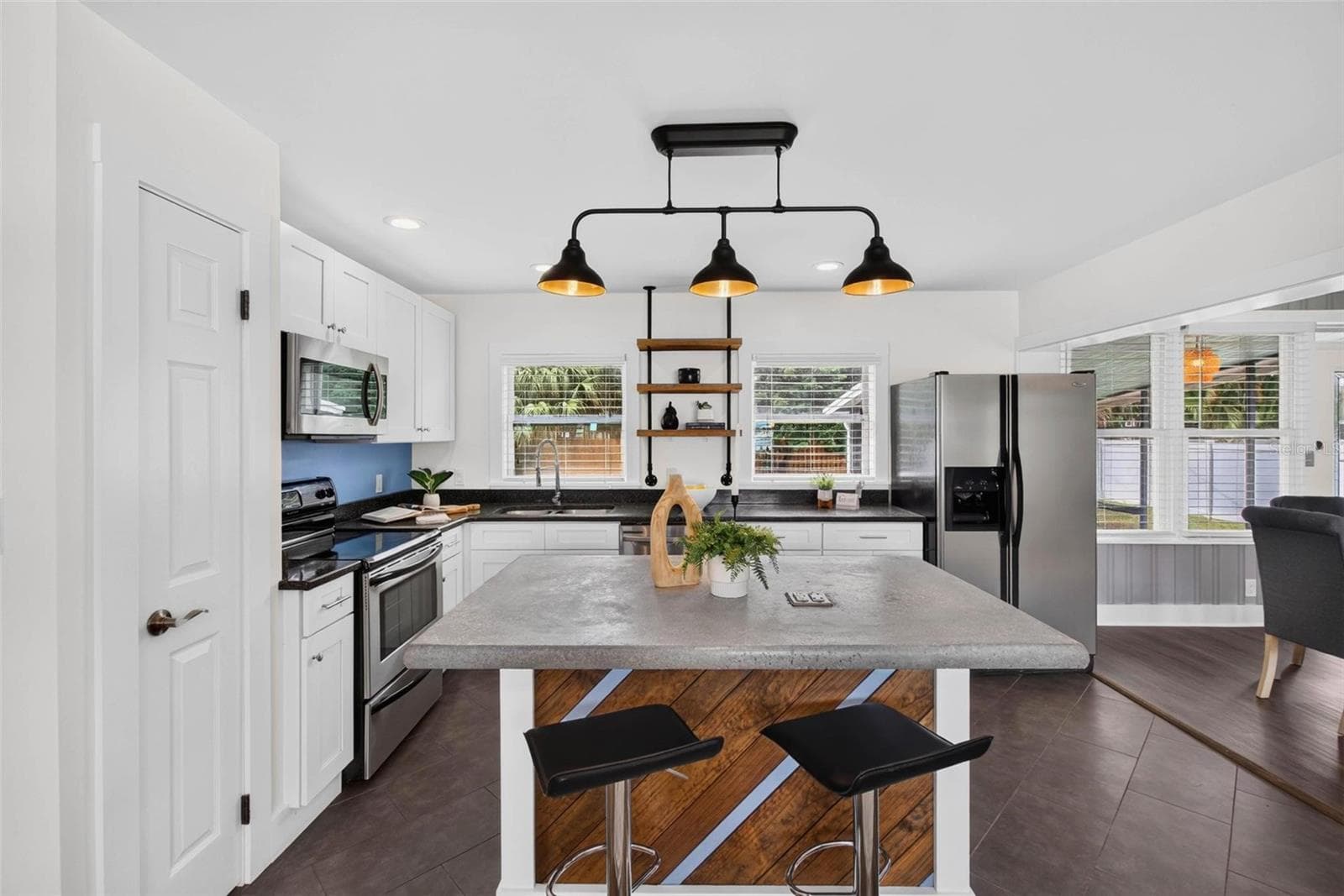 Kitchen has unique artistic touches throughout - 3312 MELTON ST N, ST PETERSBURG