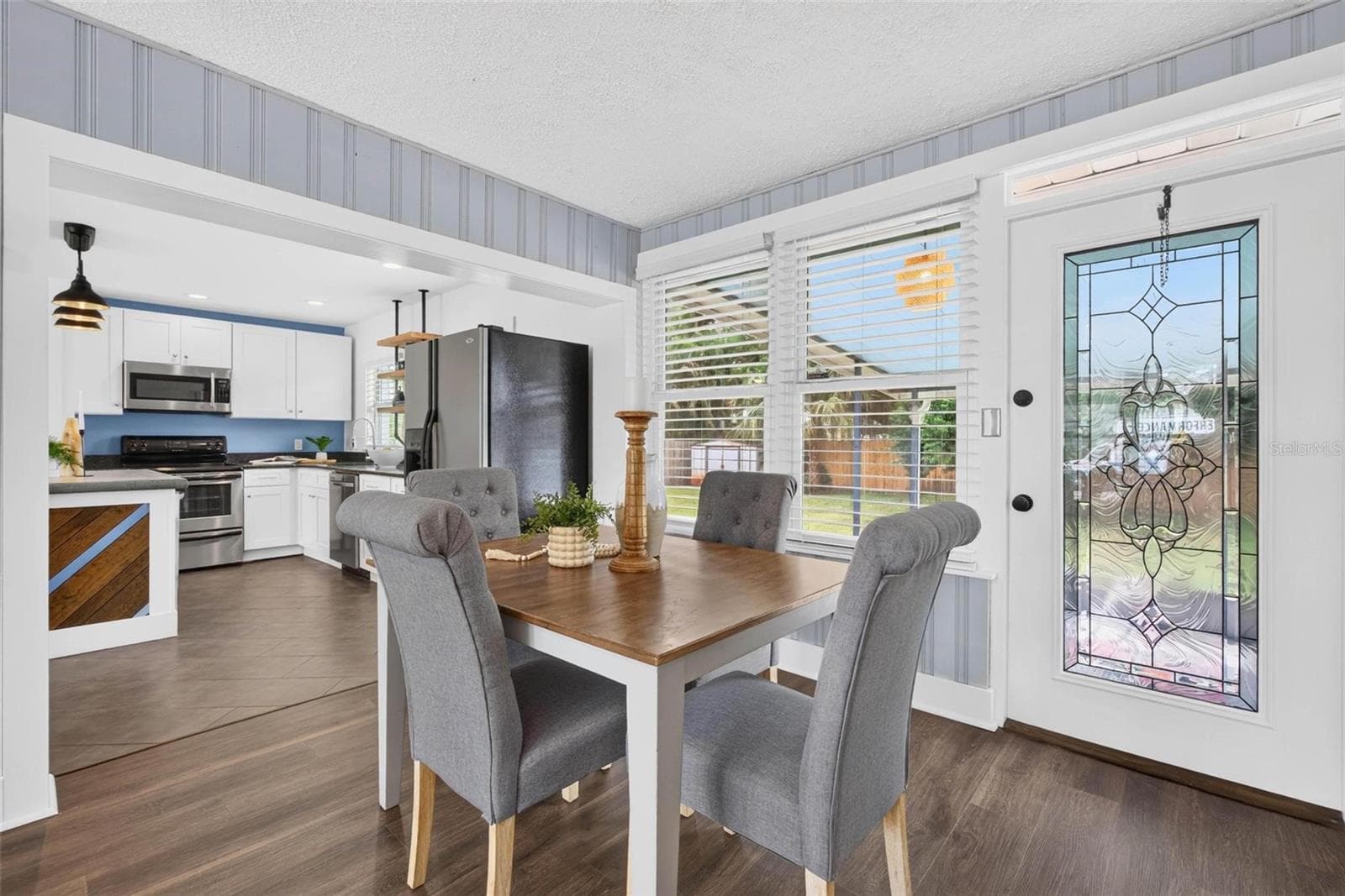 Den has space for dining area and additional living area - 3312 MELTON ST N, ST PETERSBURG