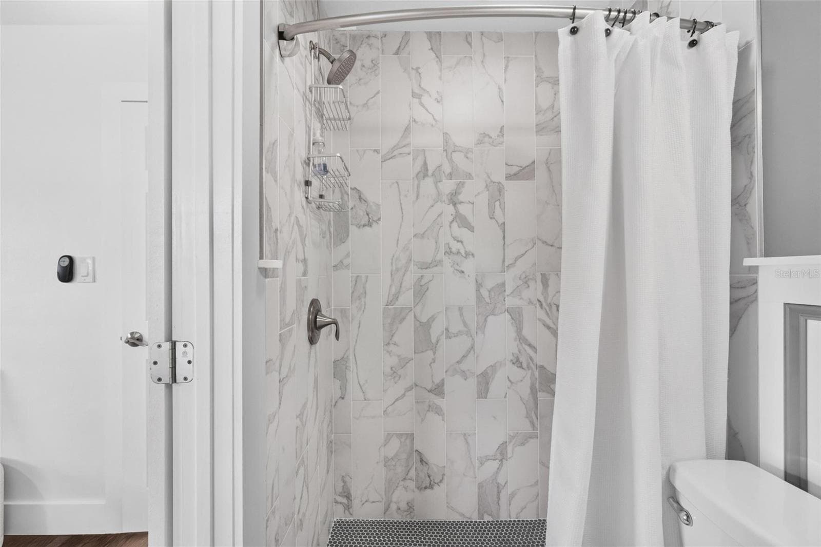 Beautiful tilework in the shower - 3312 MELTON ST N, ST PETERSBURG