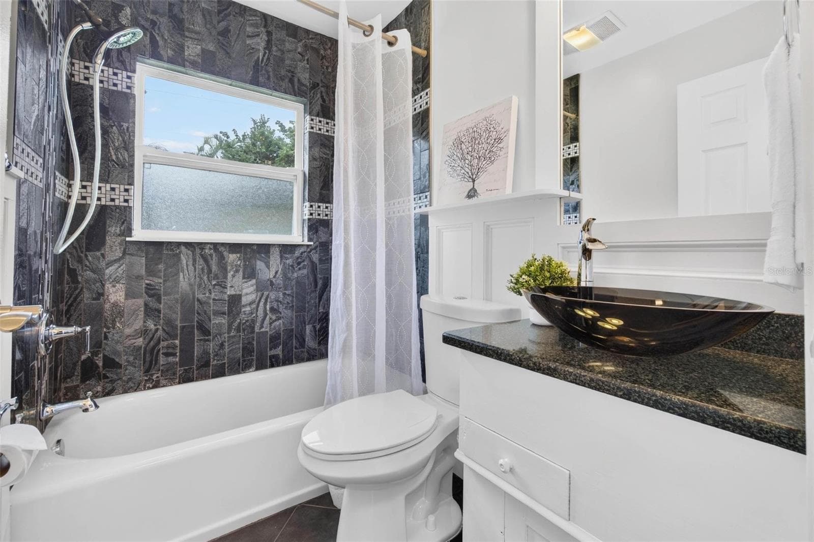Second full bathroom has also been updated. - 3312 MELTON ST N, ST PETERSBURG