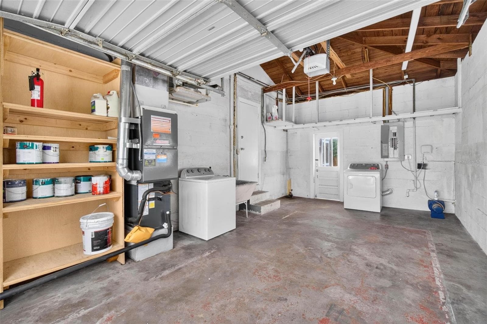This home also features an attached one car garage - 3312 MELTON ST N, ST PETERSBURG