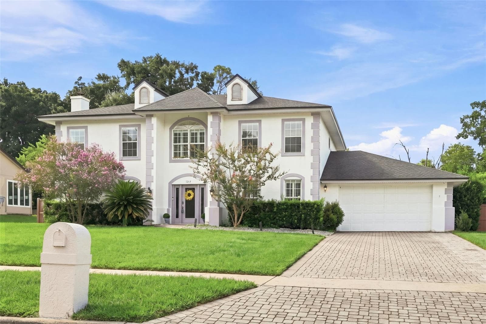 Expanded Paver Driveway leading to 2+ car garage - 1349 VALLEY PINE CIR, APOPKA