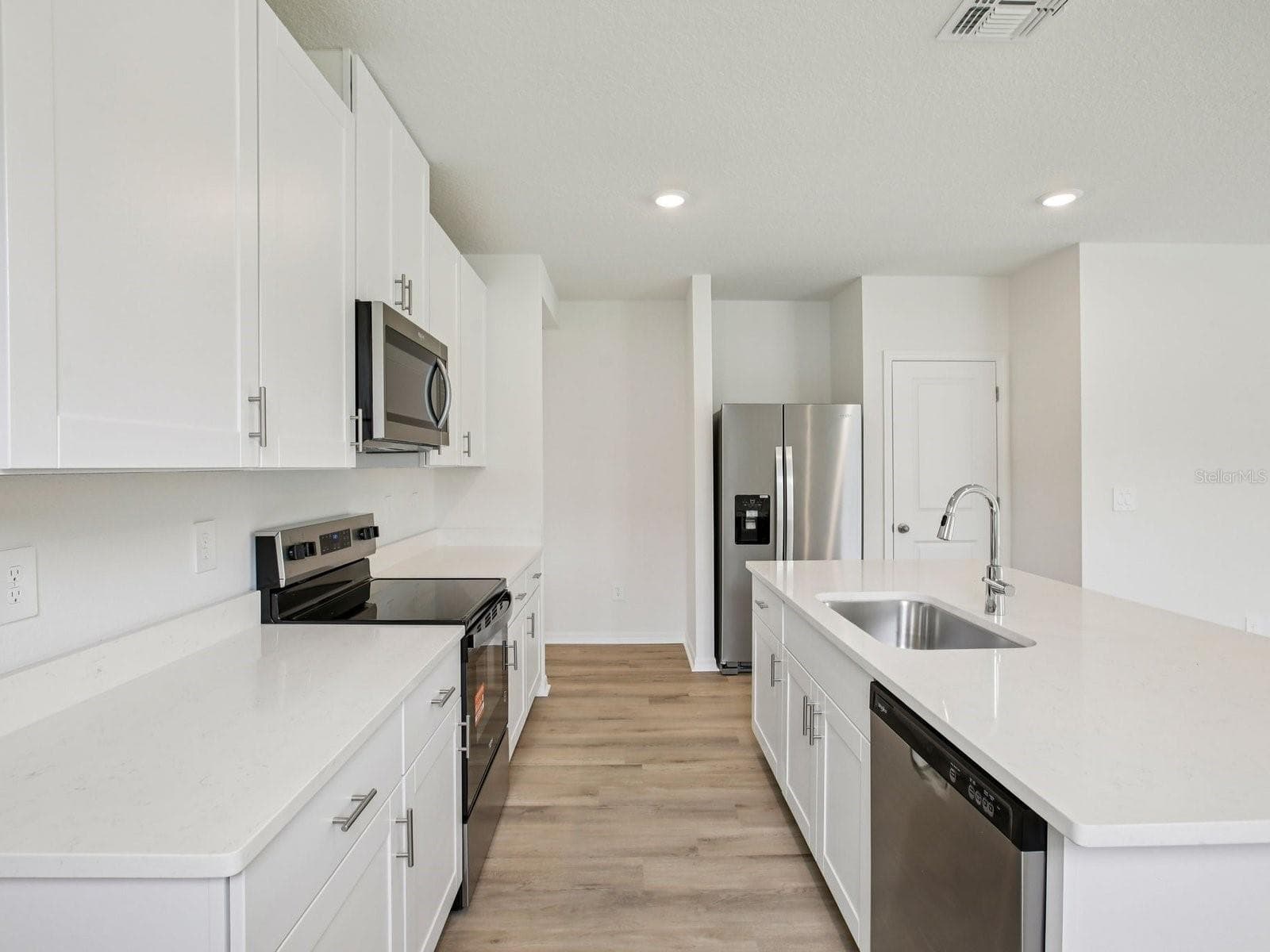 Photo is not of the actual home but of a builder home with same floorplan with similar interior finishes. - 3818 MOSCATO DR, BROOKSVILLE