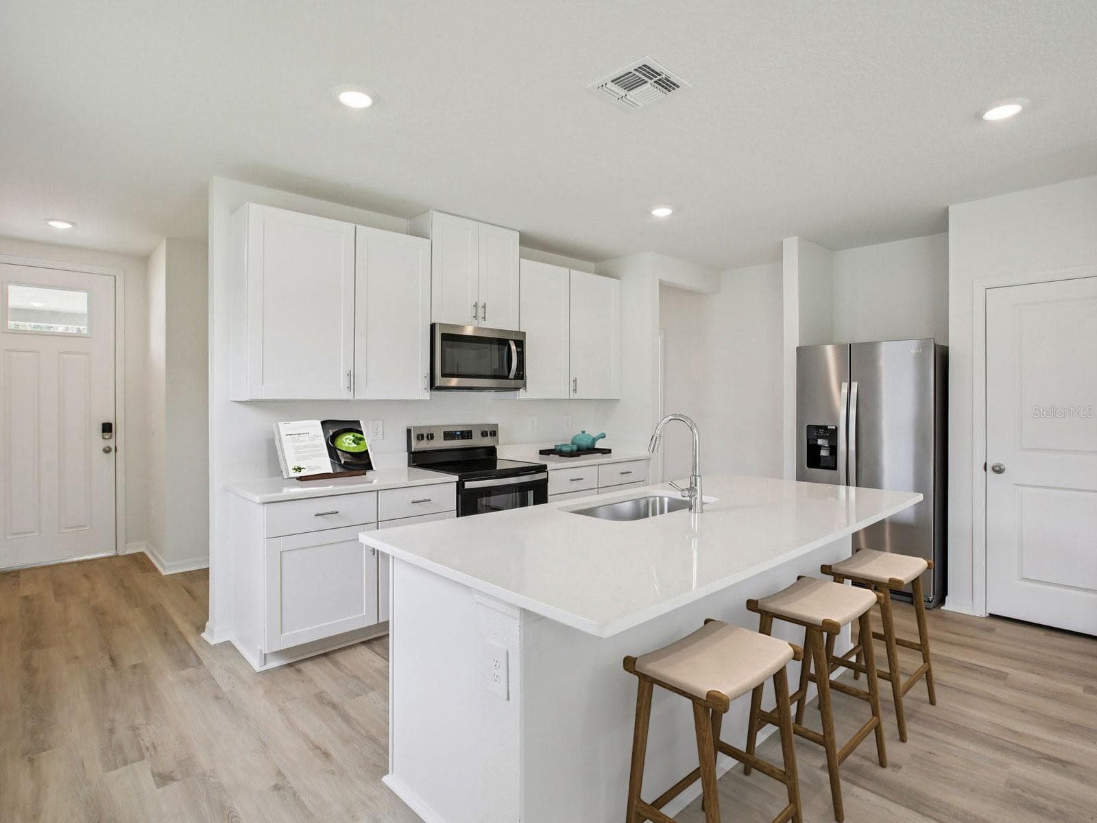 Photo is not of the actual home but of a builder home with same floorplan with similar interior finishes. - 3818 MOSCATO DR, BROOKSVILLE