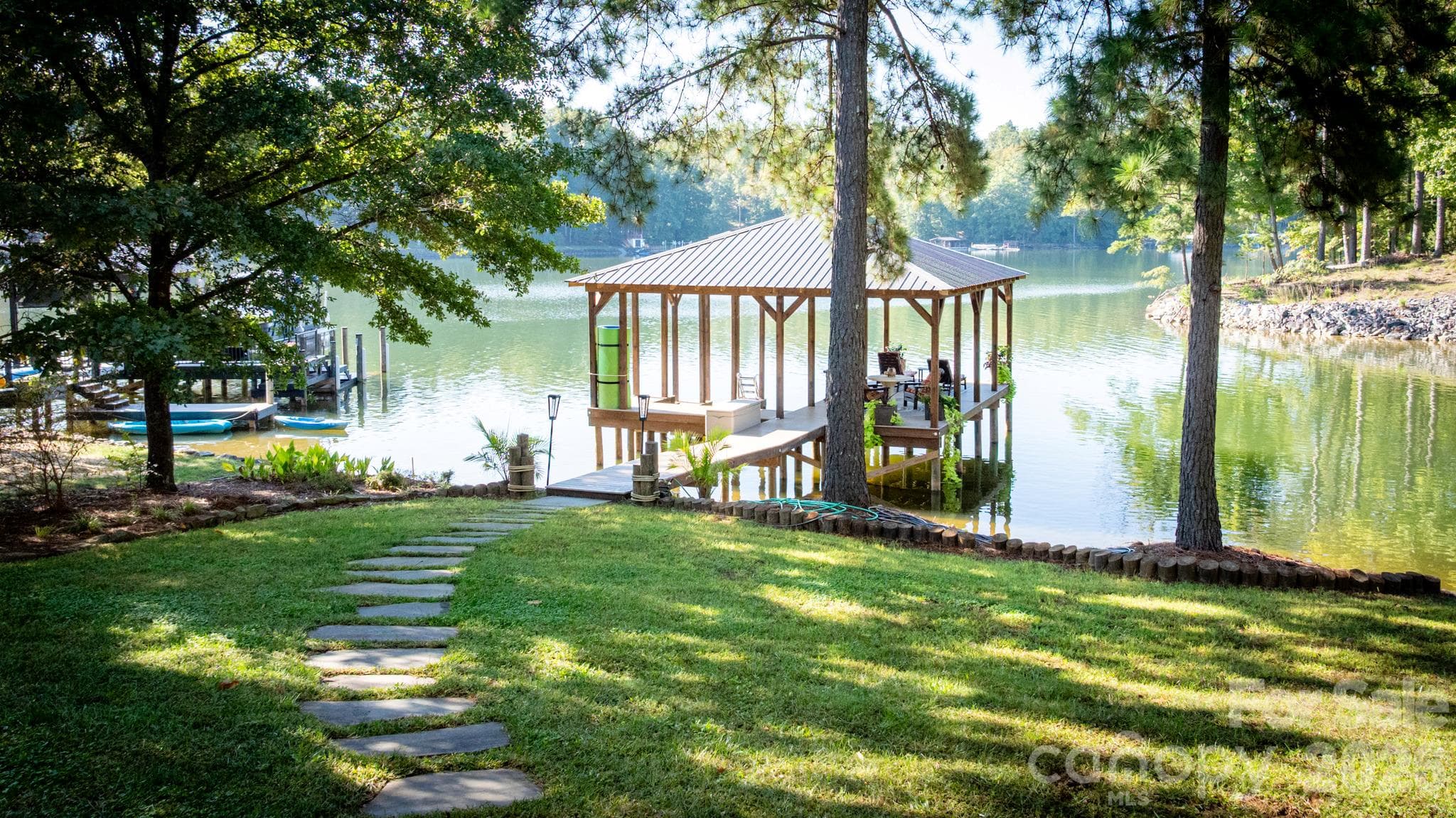 The stabalized & covered dock features year-round deep water - 1285 Saunders Drive, Catawba