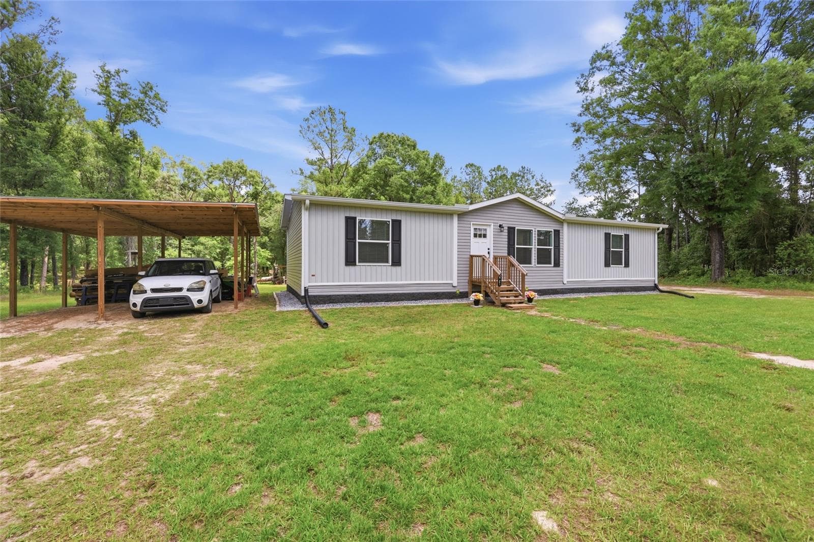 Manufactured Home at 9367 254TH TER, O'BRIEN, photo 15 of 23