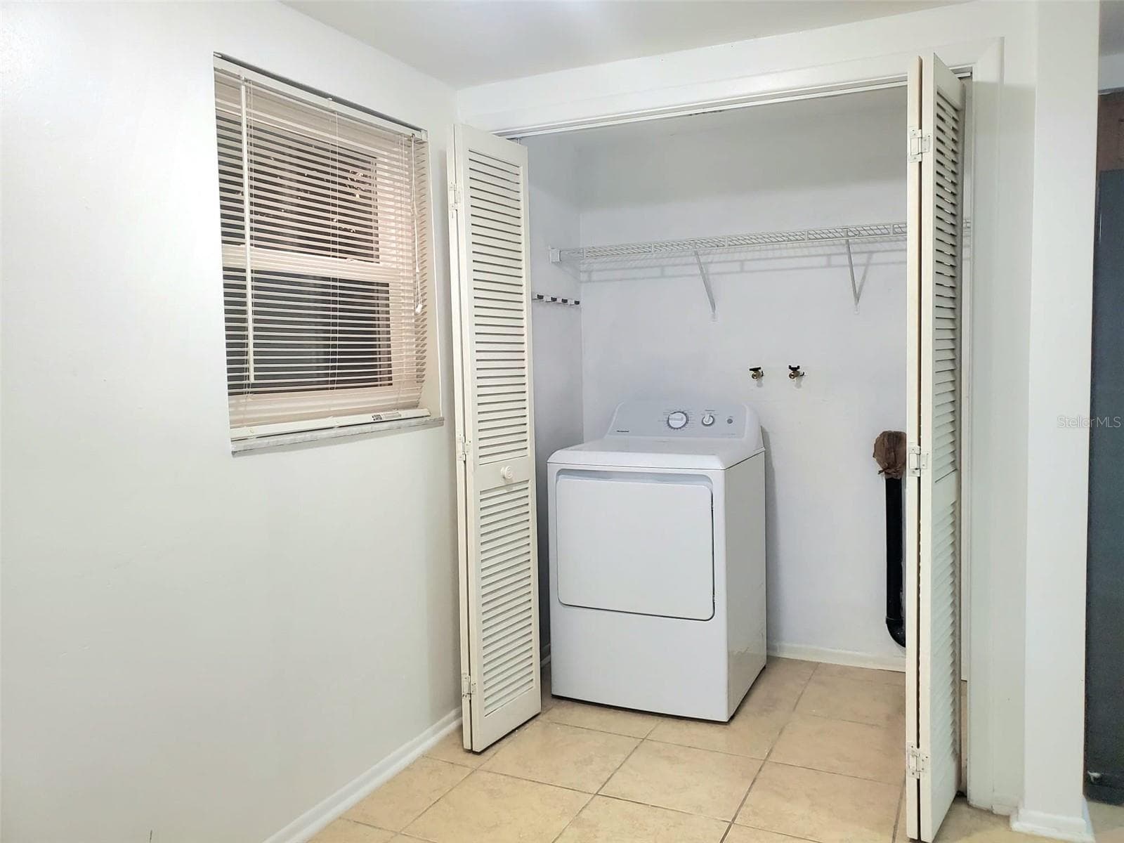 Indoor laundry adds everyday convenience - 7700 BIRCHWOOD DR, PORT RICHEY