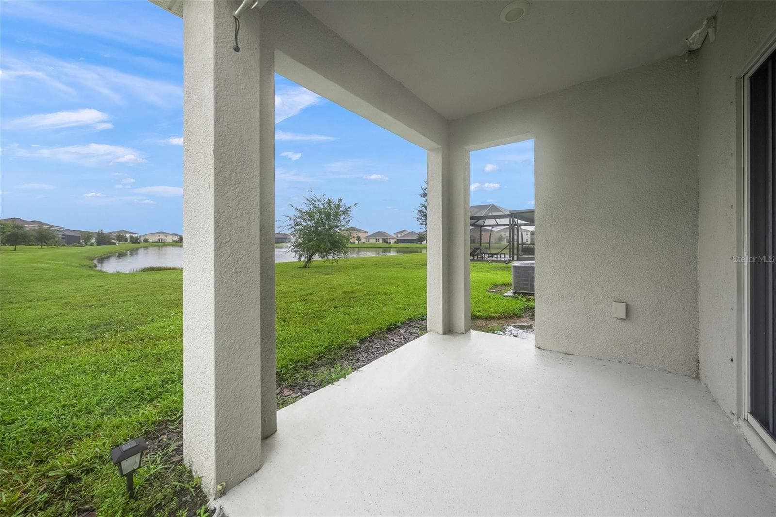 Covered Porch - 5215 MONTELENA CV SW, BRADENTON
