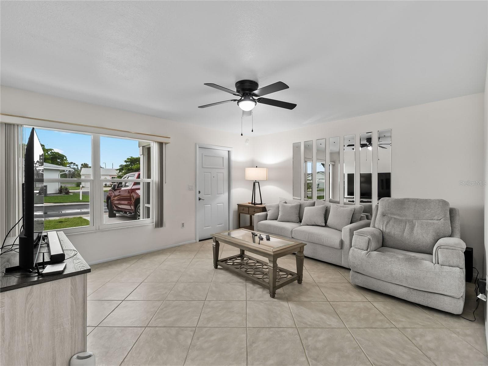 LivingRoom_8130PickwickRd_NorthPort_OpenConcept_WindowView.jpg - 8130 PICKWICK RD, NORTH PORT