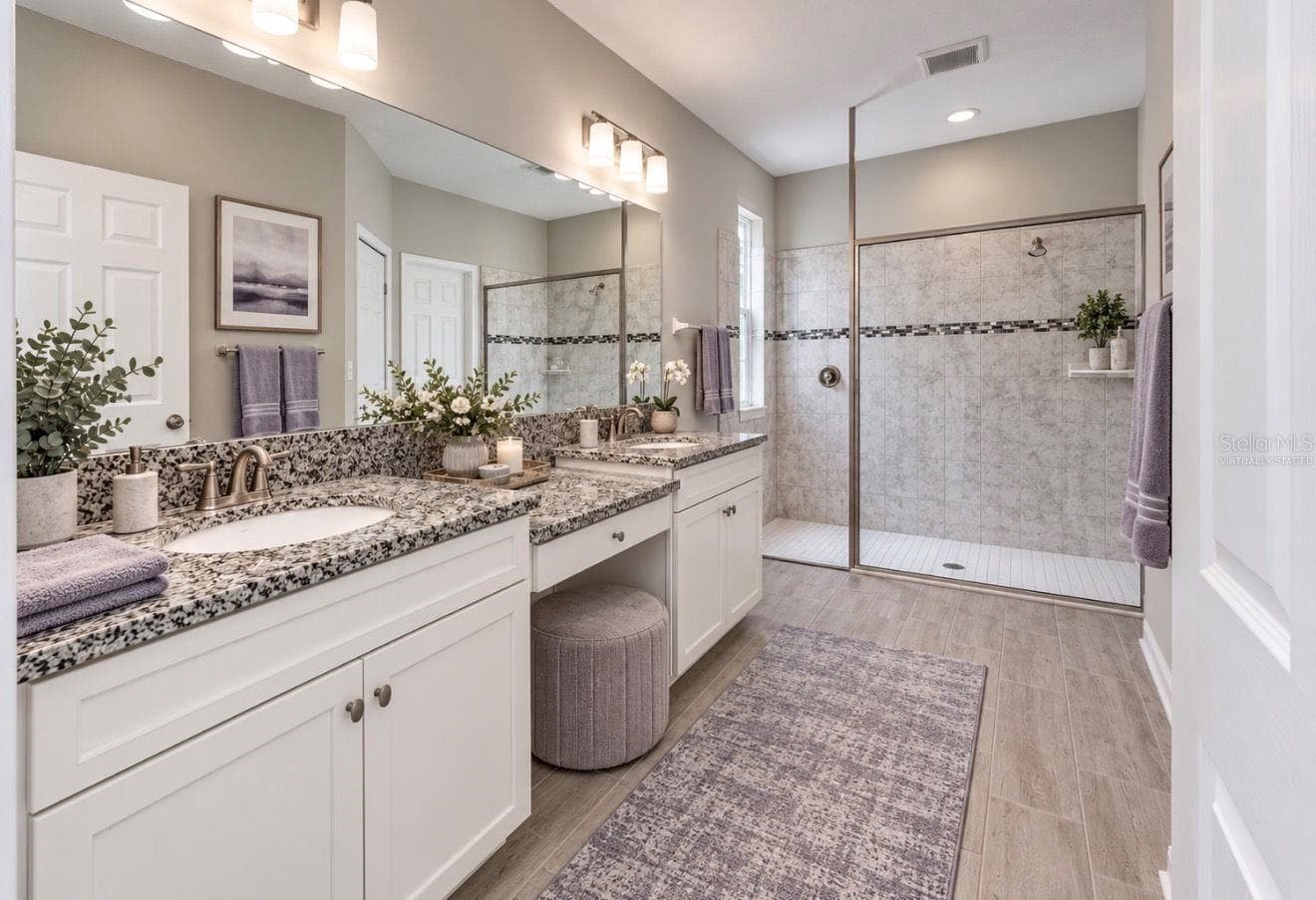 First Floor Primary Ensuite Bathroom. Virtually staged - 3179 MARINE GRASS DR, WIMAUMA