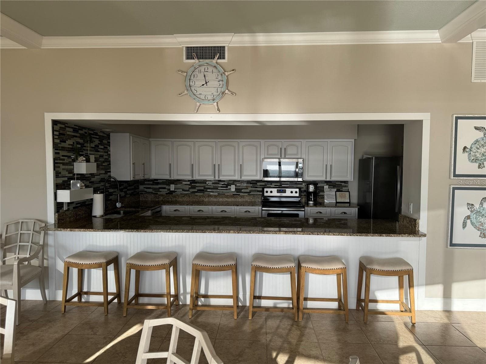 Community Room kitchen pass through - 4745 S ATLANTIC AVE #102, PONCE INLET