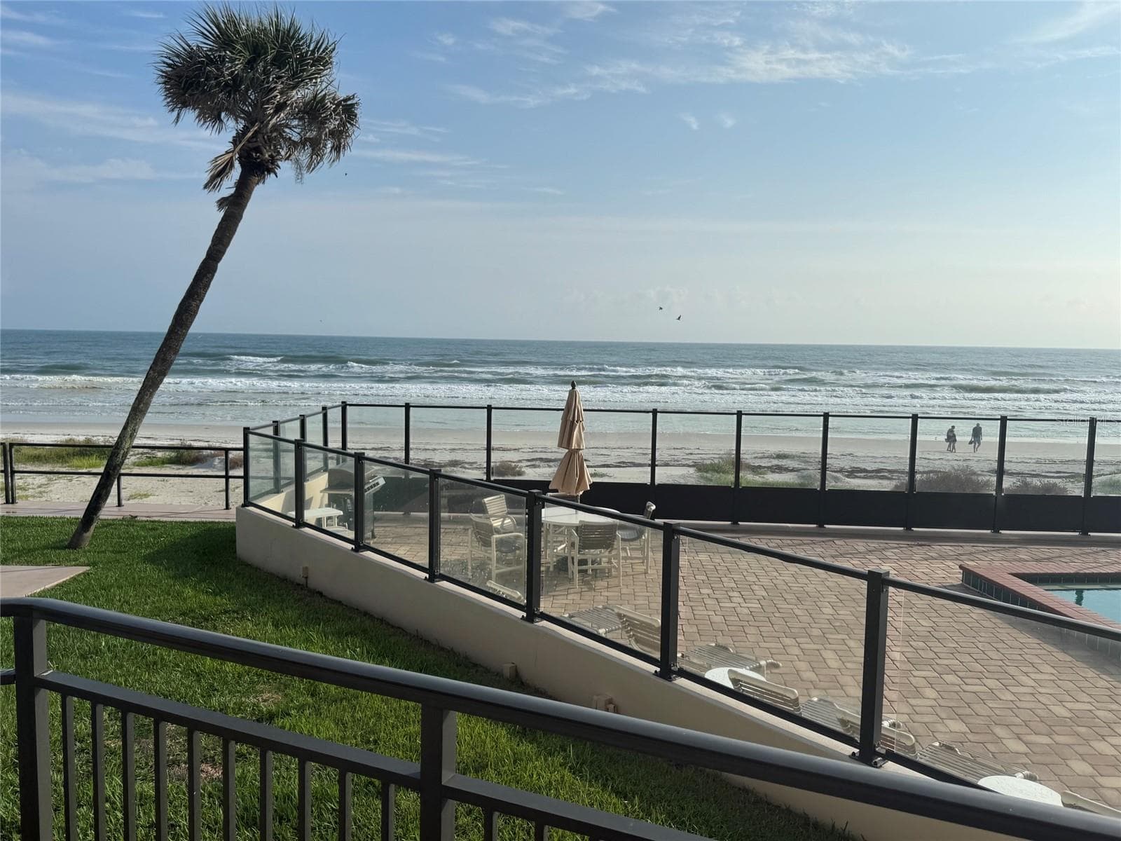 Pool deck and grill area - 4745 S ATLANTIC AVE #102, PONCE INLET