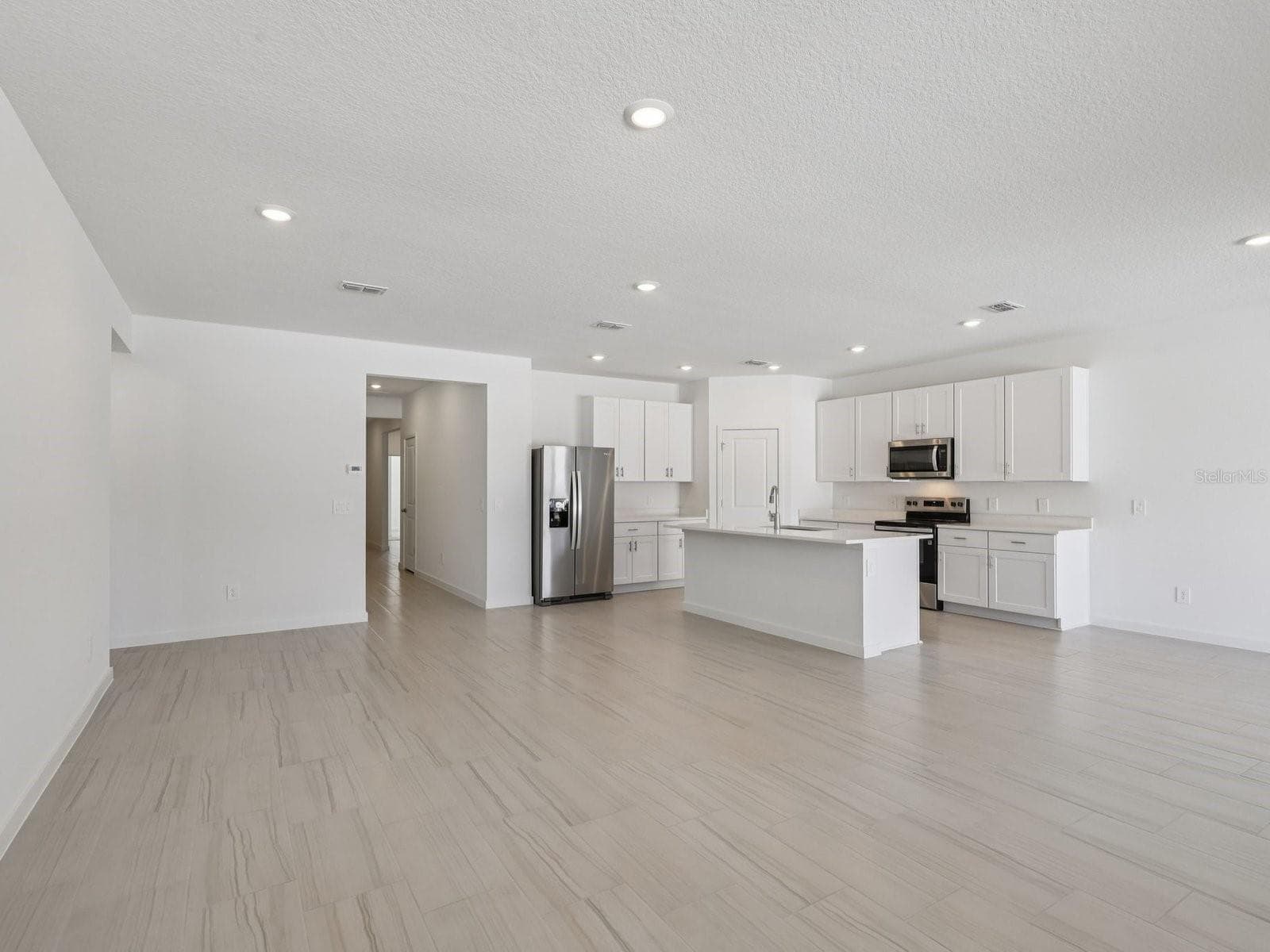 Photo is not of the actual home, but is an inspirational photo of builder’s model home and may depict options, furnishings, and/or decorator features that are not included. - 37 GARNI DR, PALM COAST