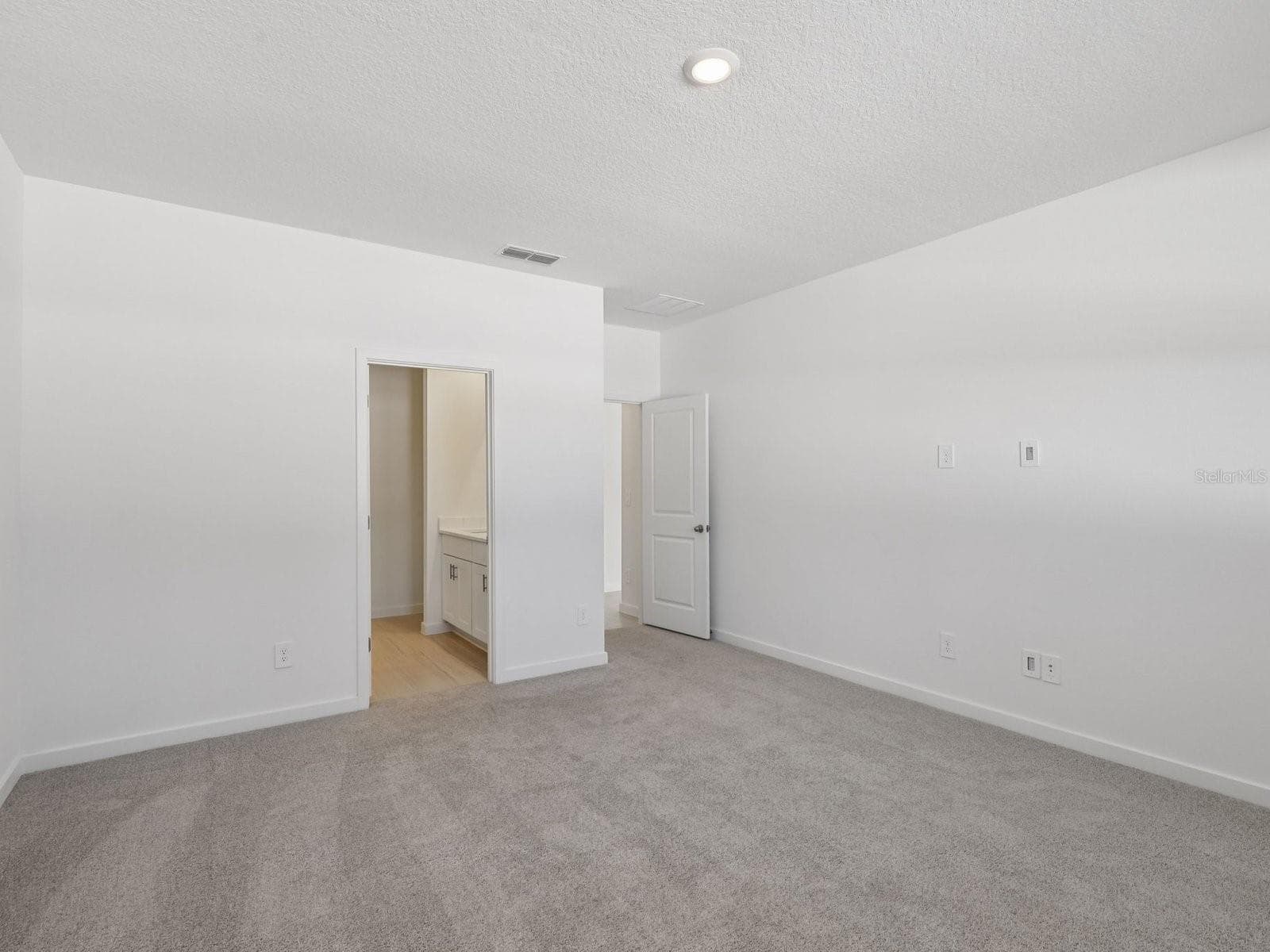 Photo is not of the actual home, but is an inspirational photo of builder’s model home and may depict options, furnishings, and/or decorator features that are not included. - 37 GARNI DR, PALM COAST