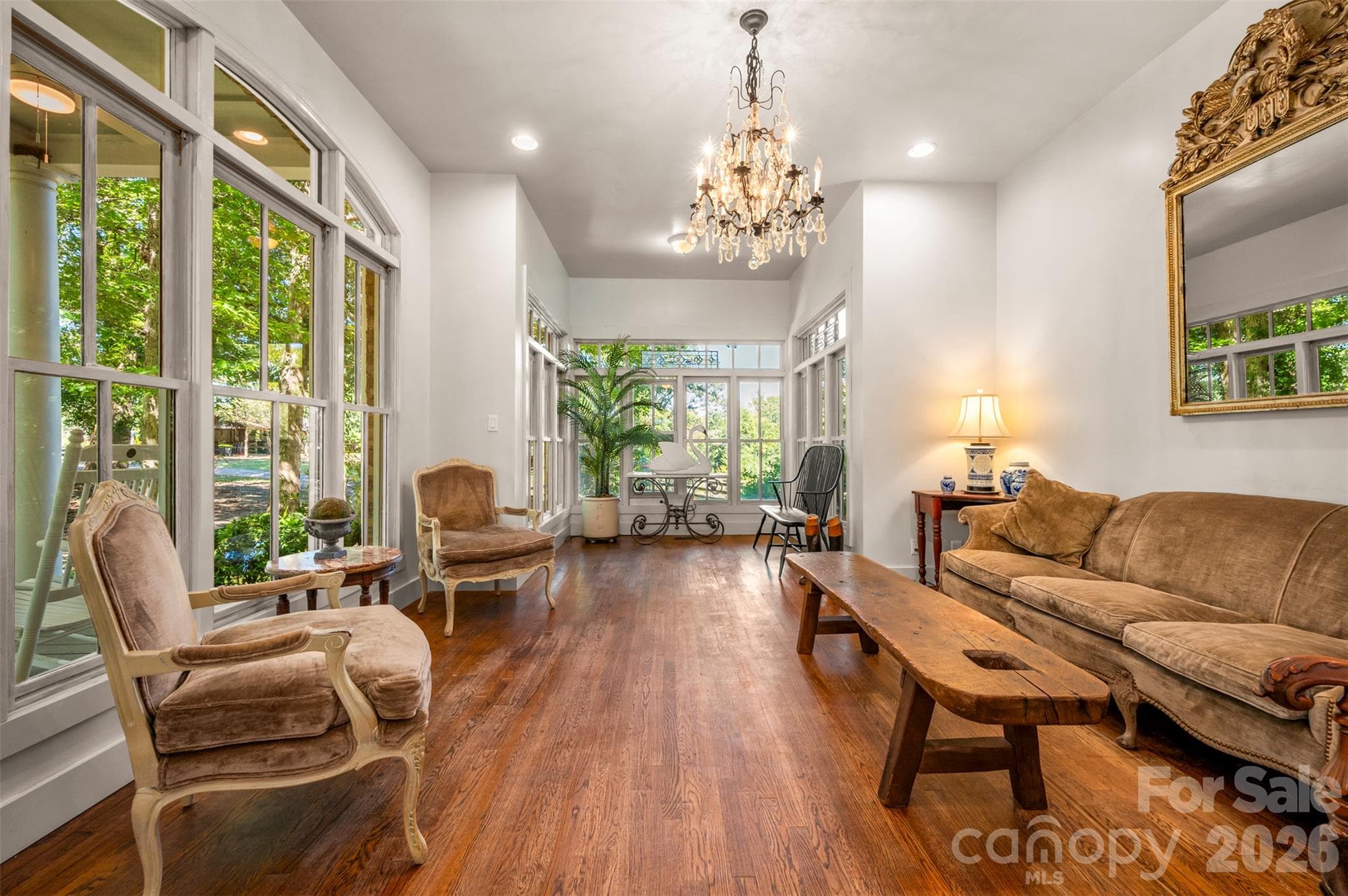 Expansive windows with transoms throughout lower level. - 600 John Weaver Road, Columbus