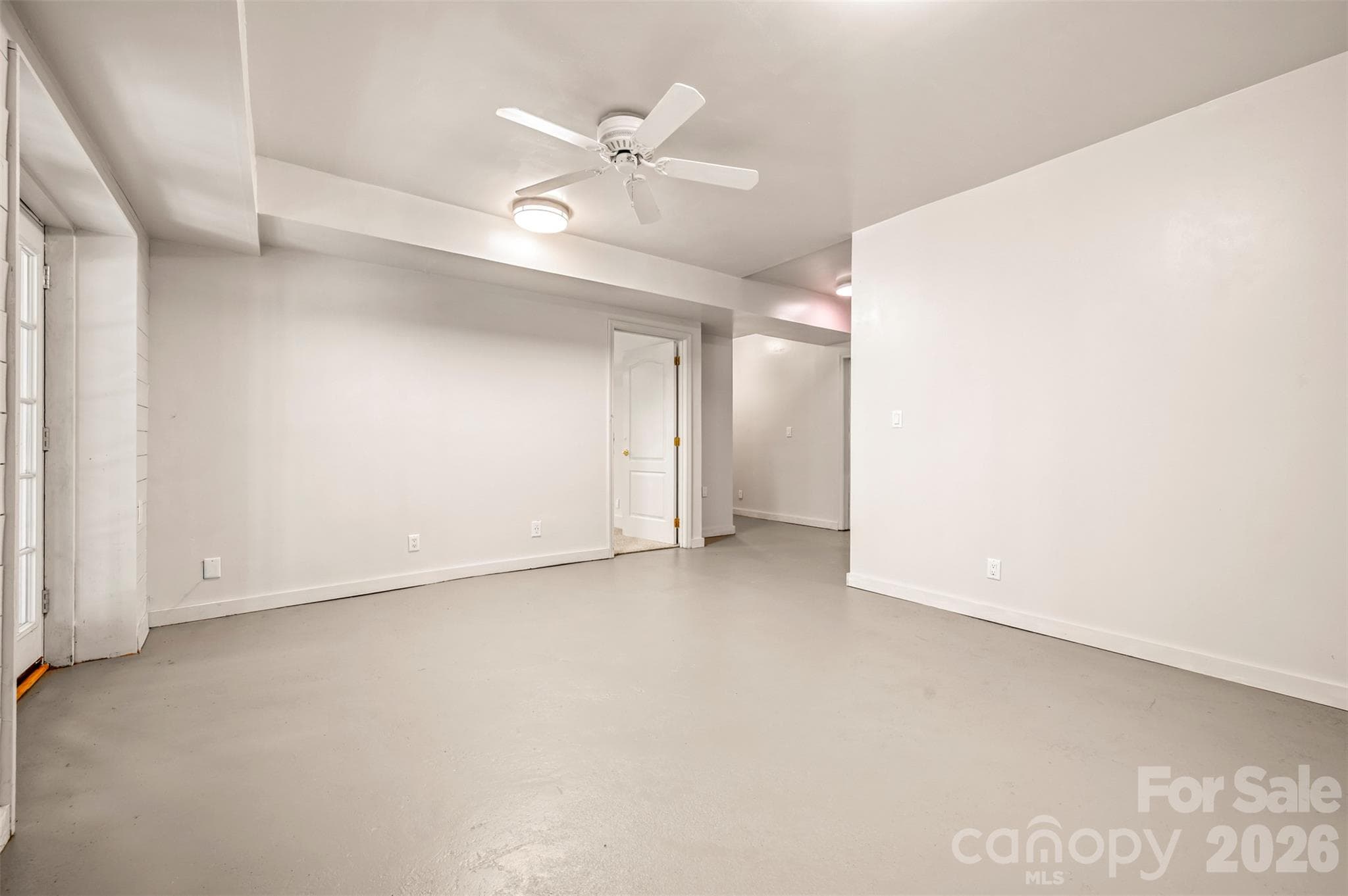 View 2 of basement family room.  Door to right to 4th bedroom - 600 John Weaver Road, Columbus