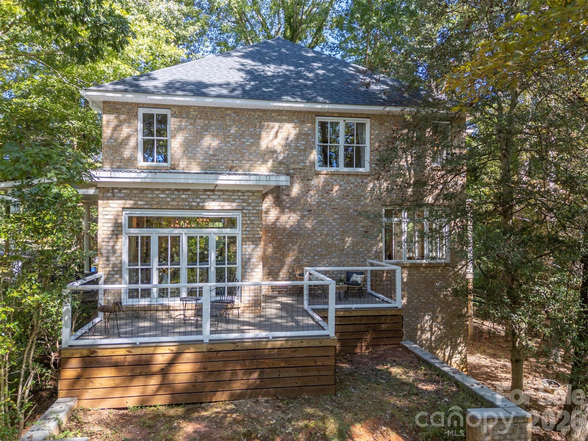 View of side deck which is accessed by the sunroom - 600 John Weaver Road, Columbus